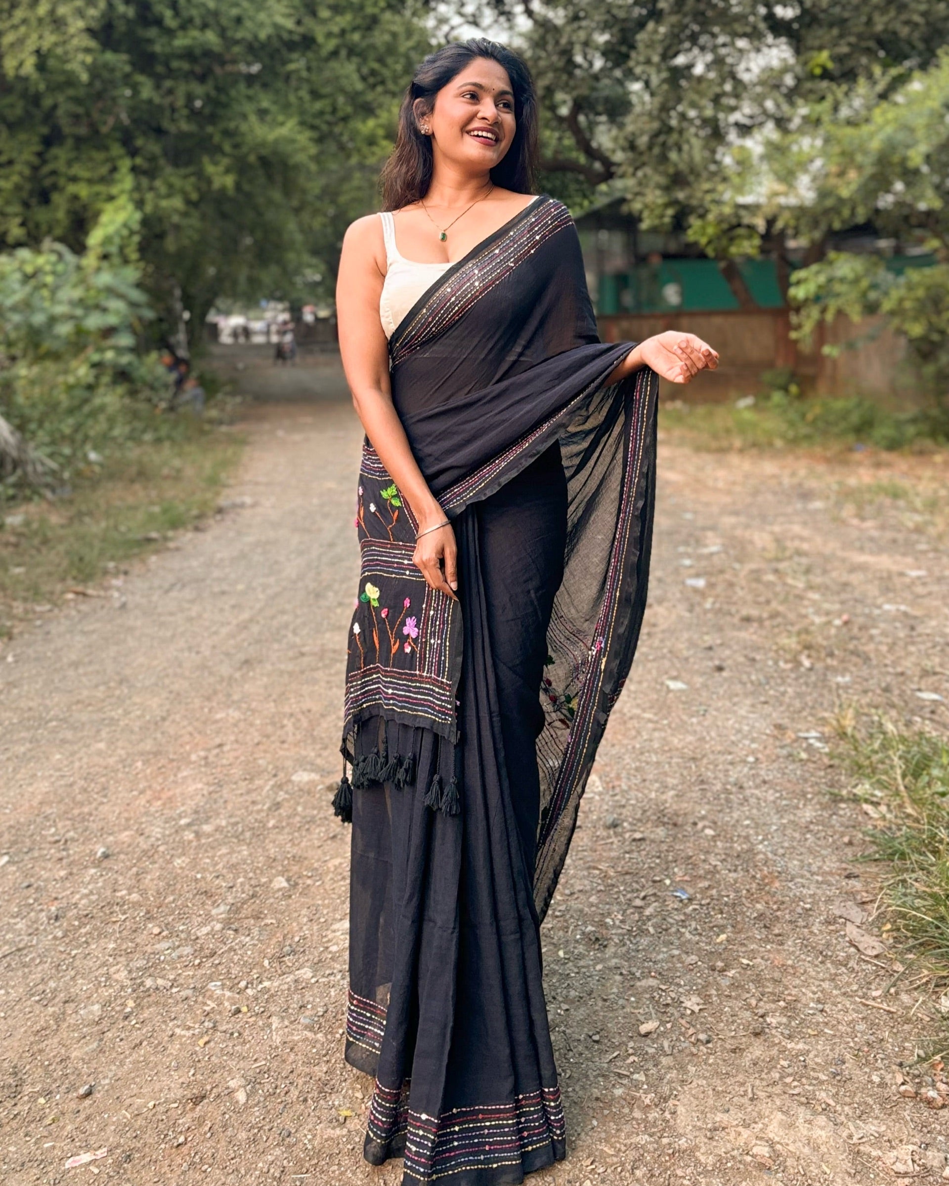 Noir Petal Nocturne black embroidered mulmul saree with elegant handcrafted detailing