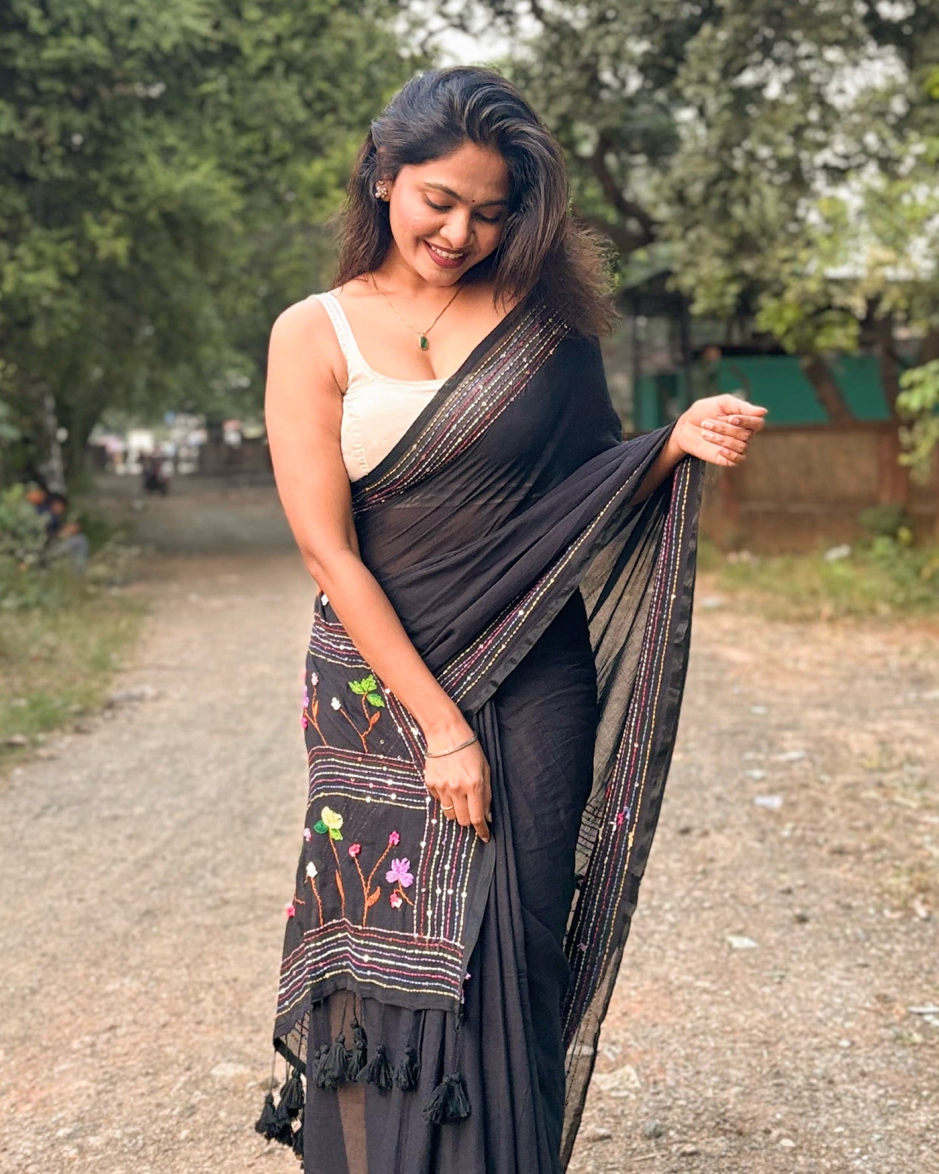 Noir Petal Nocturne black embroidered mulmul saree with elegant handcrafted detailing