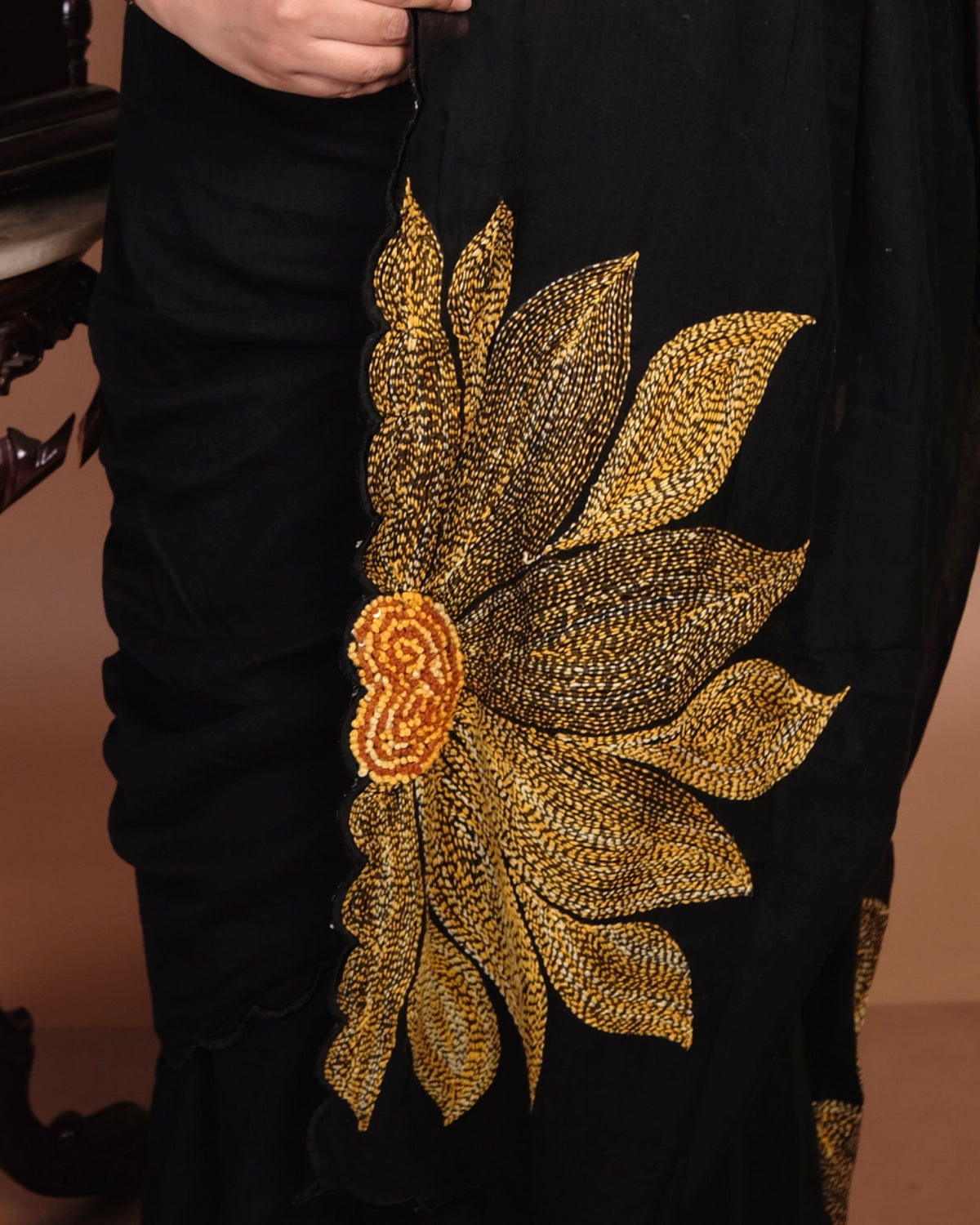 Soft and comfortable light weight black mulmul cotton saree by Shopaame with sunflower embroidery sequins embellished good for festive party wear