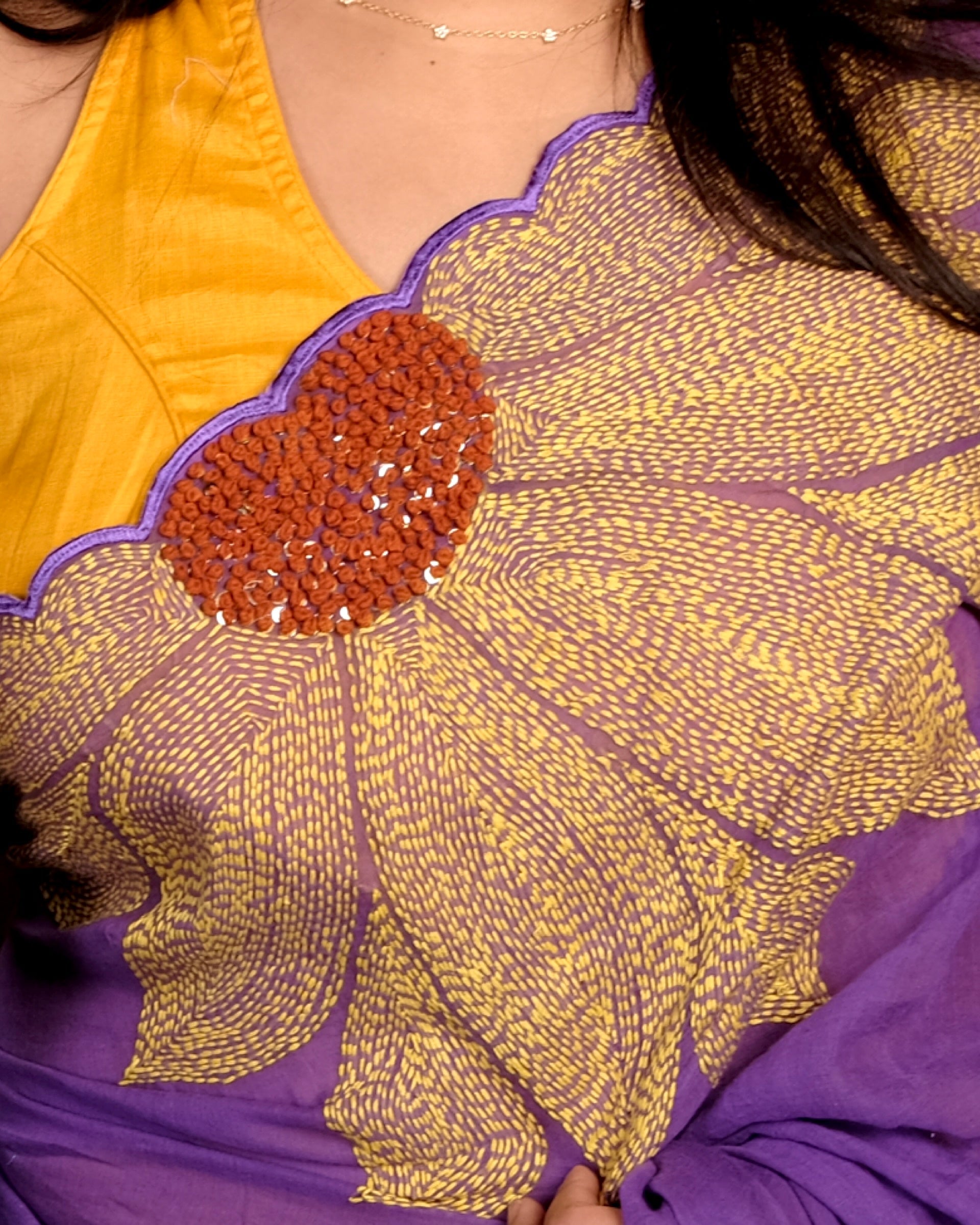 Sunshine Bloom white embroidered mulmul cotton saree with sunflower motifs, a lightweight breathable saree for summer and festive wear.
