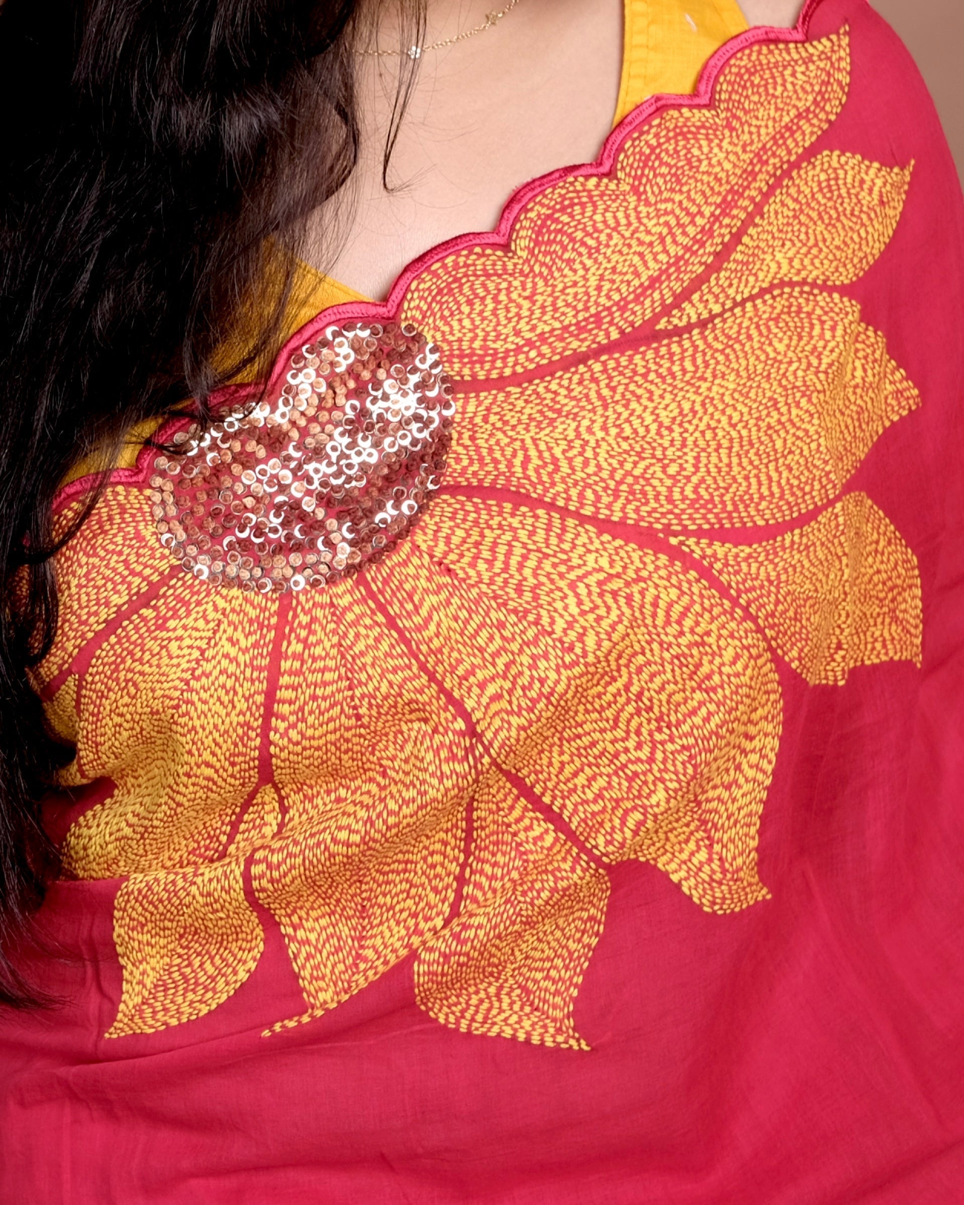 Soft and comfortable light weight red mulmul cotton saree with sunflower embroidery sequins embellished good for day time wear festive party wear