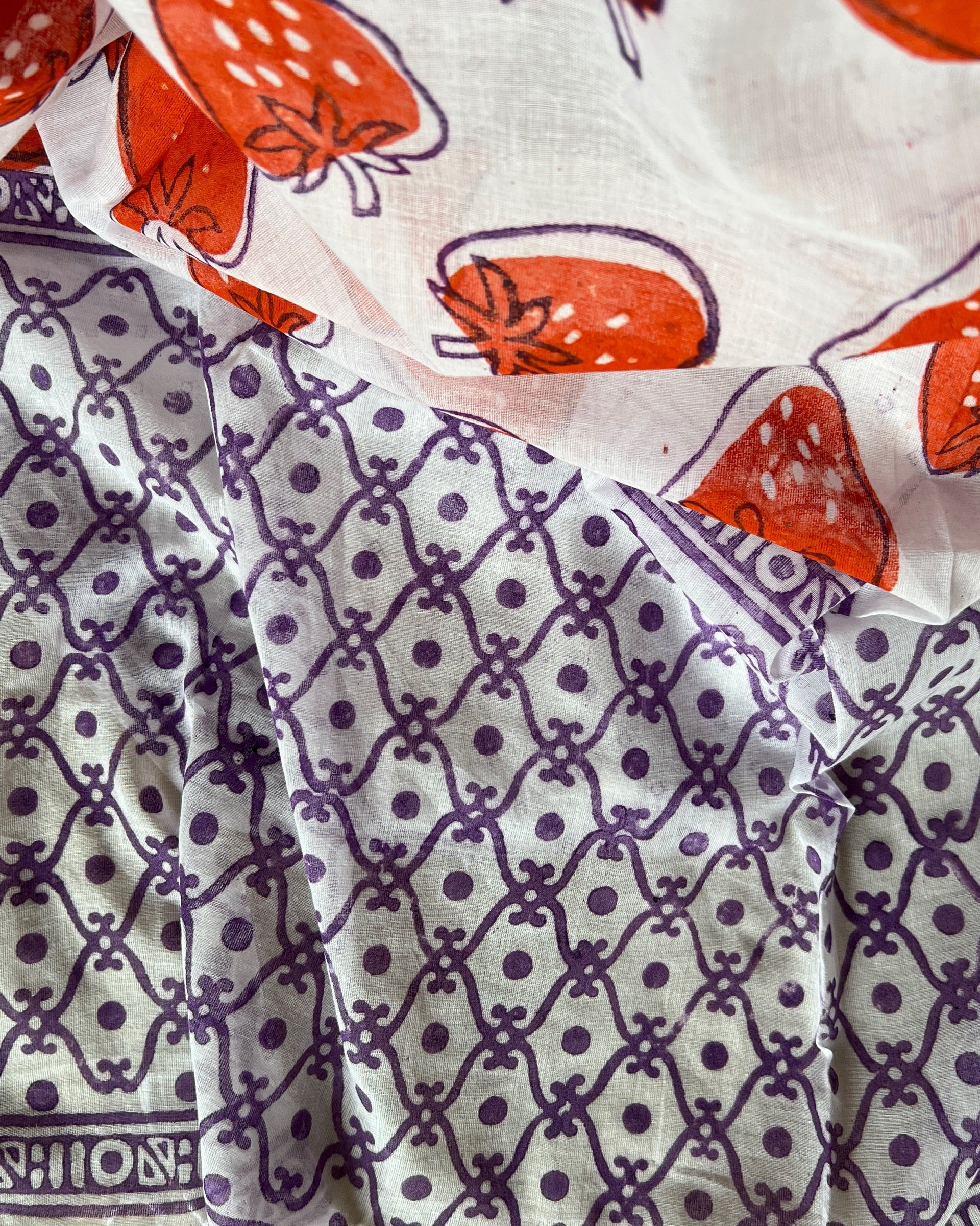 Lightweight white mulmul cotton saree with graceful printed design