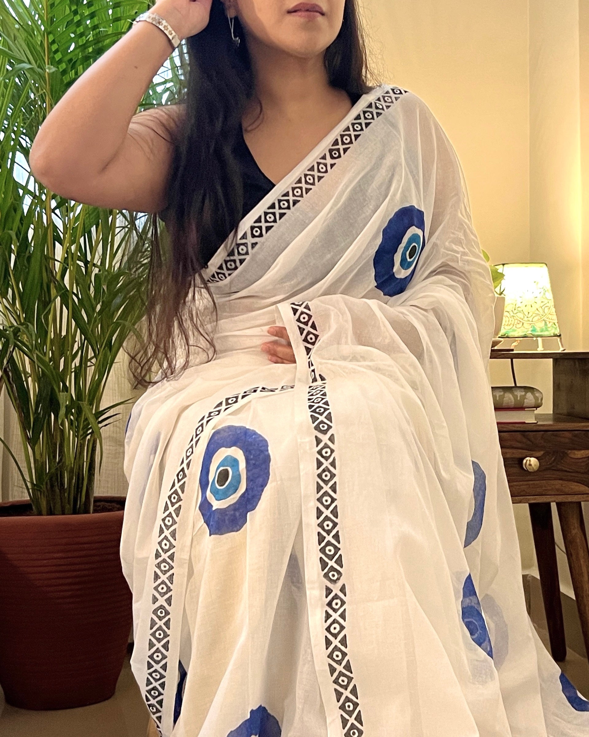 Soft & Comfortable white mulmul saree with handblock print in blue evil eye pattern