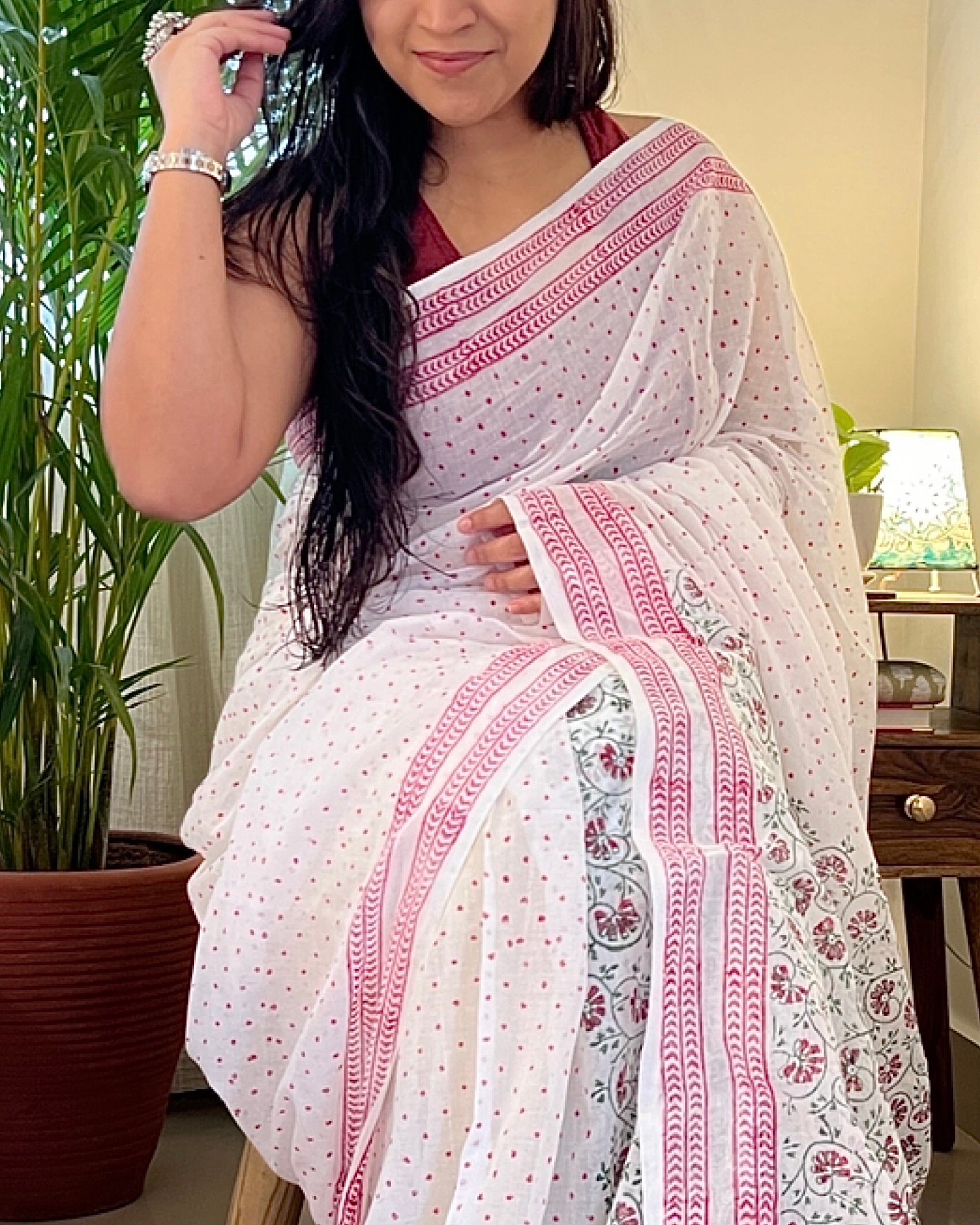 The Polkas white saree crafted with hand block print detailing for effortless elegance