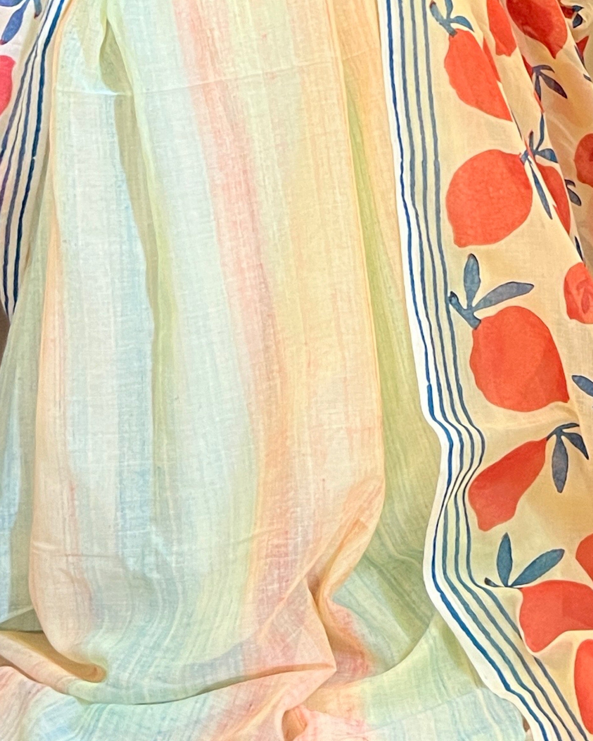 Soft & Comfortable off white mulmul saree with handblock print in orange and yellow mango aam pattern