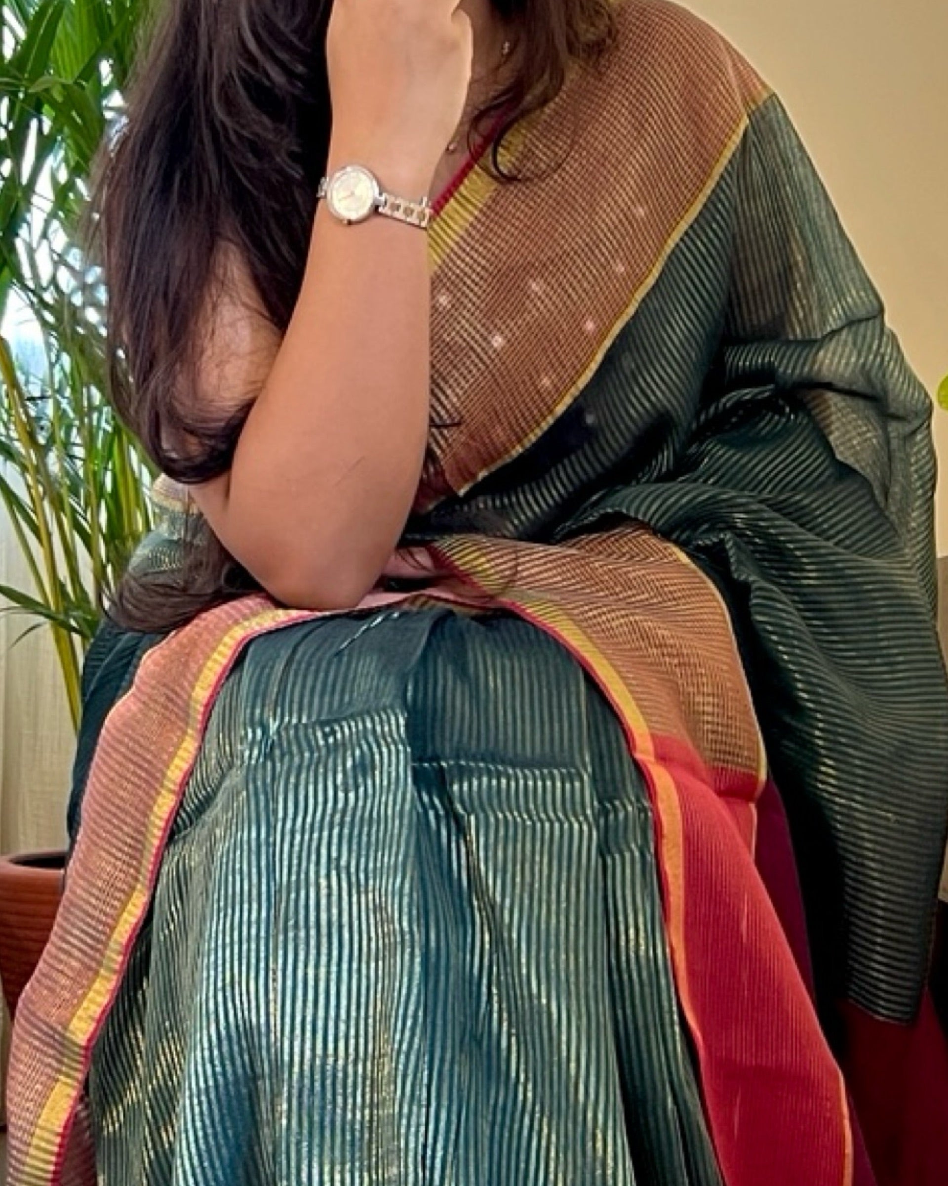 Designer green handloom cotton saree with elegant zari stripes for celebrations
