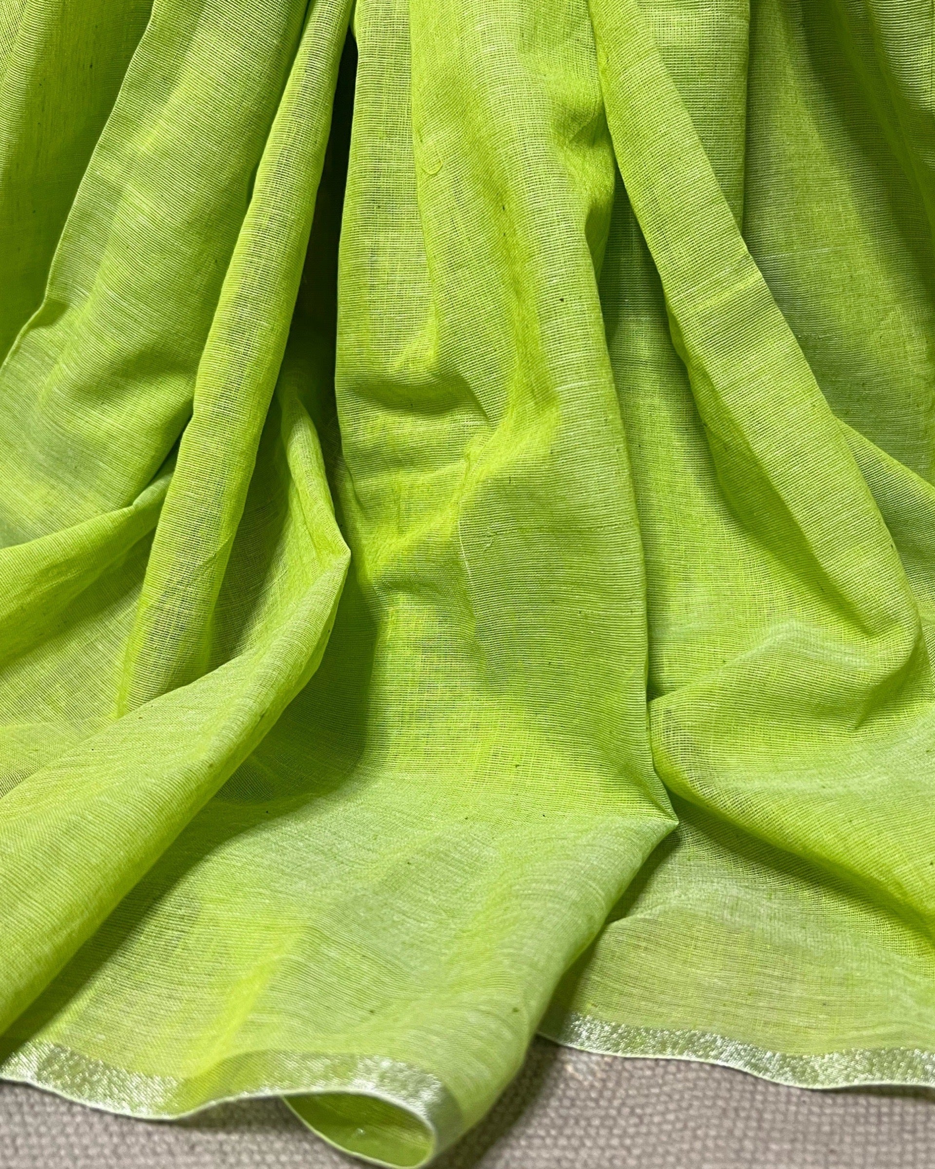 Green cotton saree with timeless ethnic elegance for everyday wear