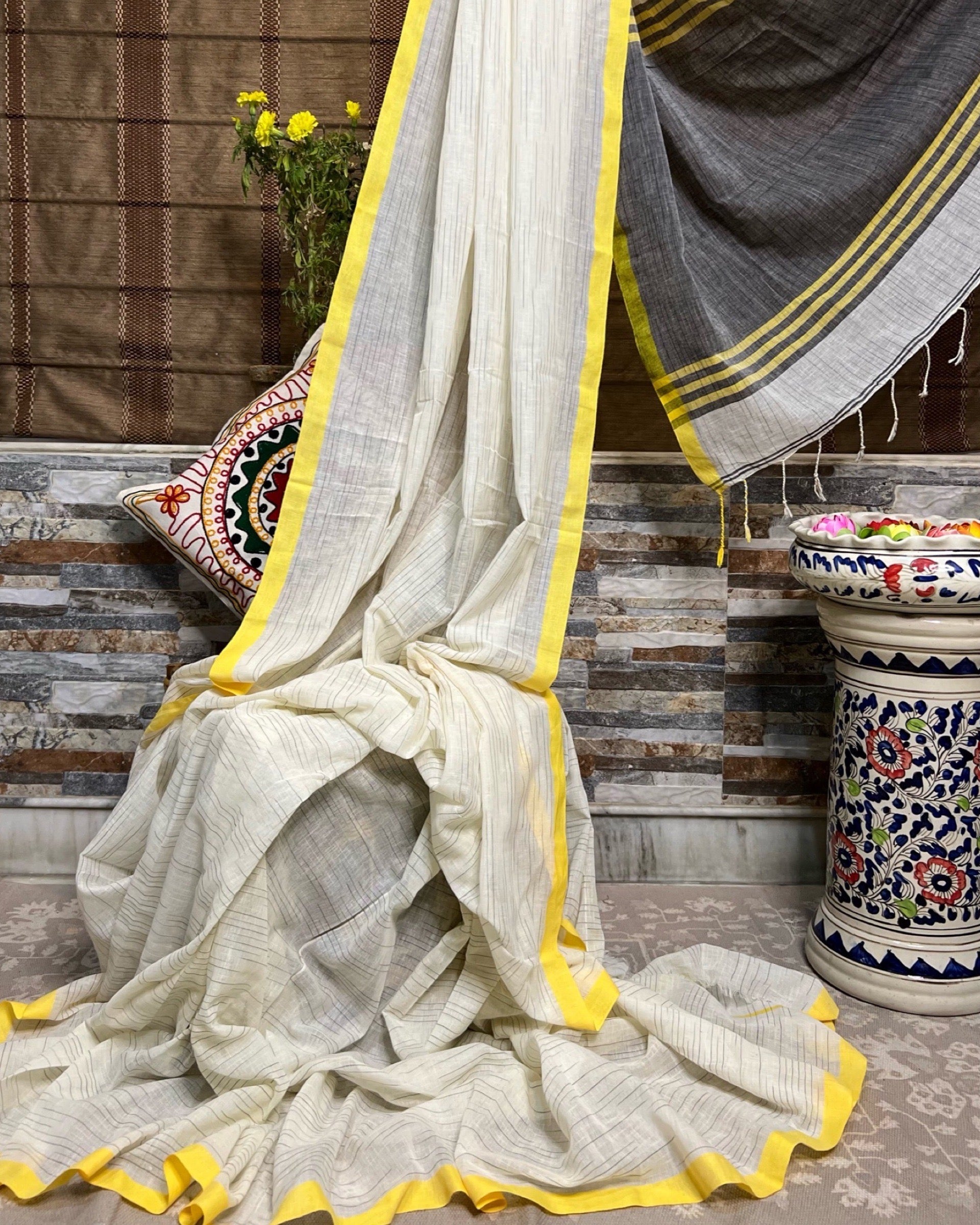 ShopAaMe Holud Paare saree in white yellow khaadi cotton