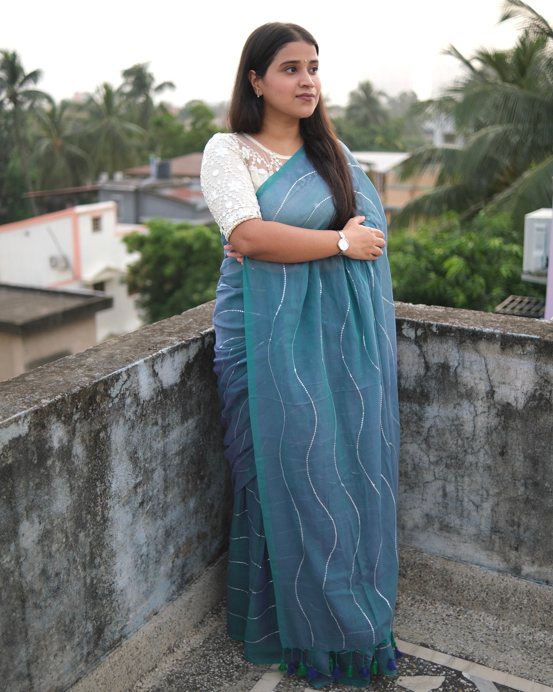 Soft mulmul cotton saree by Shopaame in blue shade with sequin emblishment for festive or party wear at reasonable price