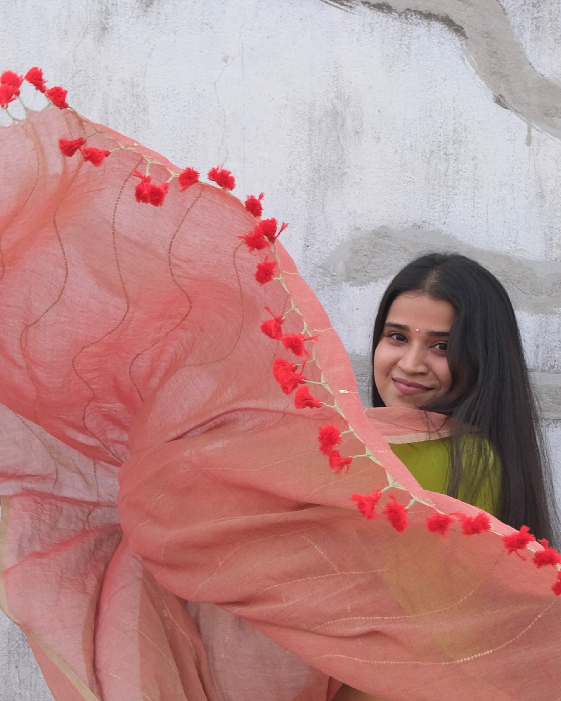 Soft and Comfortable mulmul cotton saree in dual tone peach and green shade with sequin emblishment for festive or party wear at reasonable price
