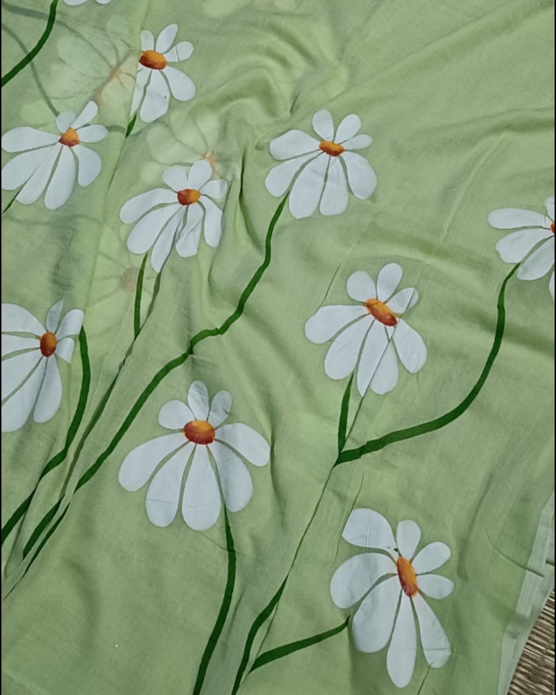 Soft and comfortable light weight light green mulmul cotton saree with floral hand painting good for day time wear