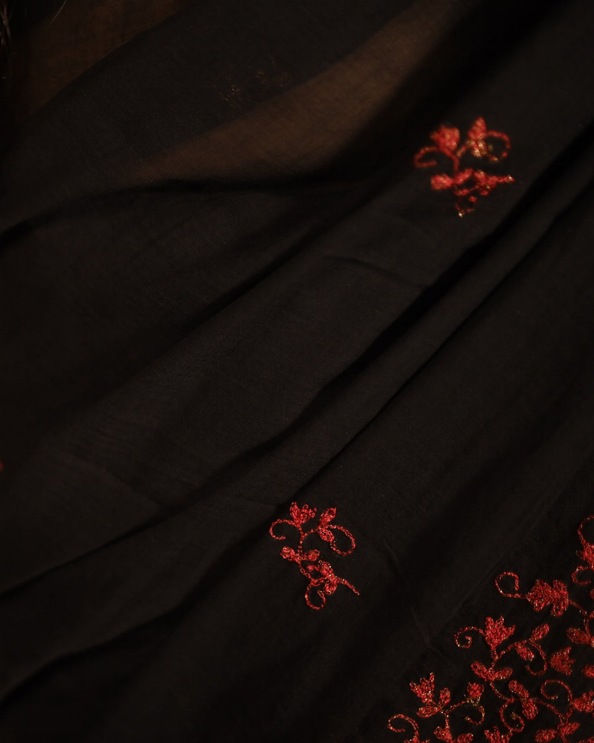 Lightweight black zari embroidered mulmul cotton Shopaame saree, handcrafted elegance for summer wear and festive occasions.