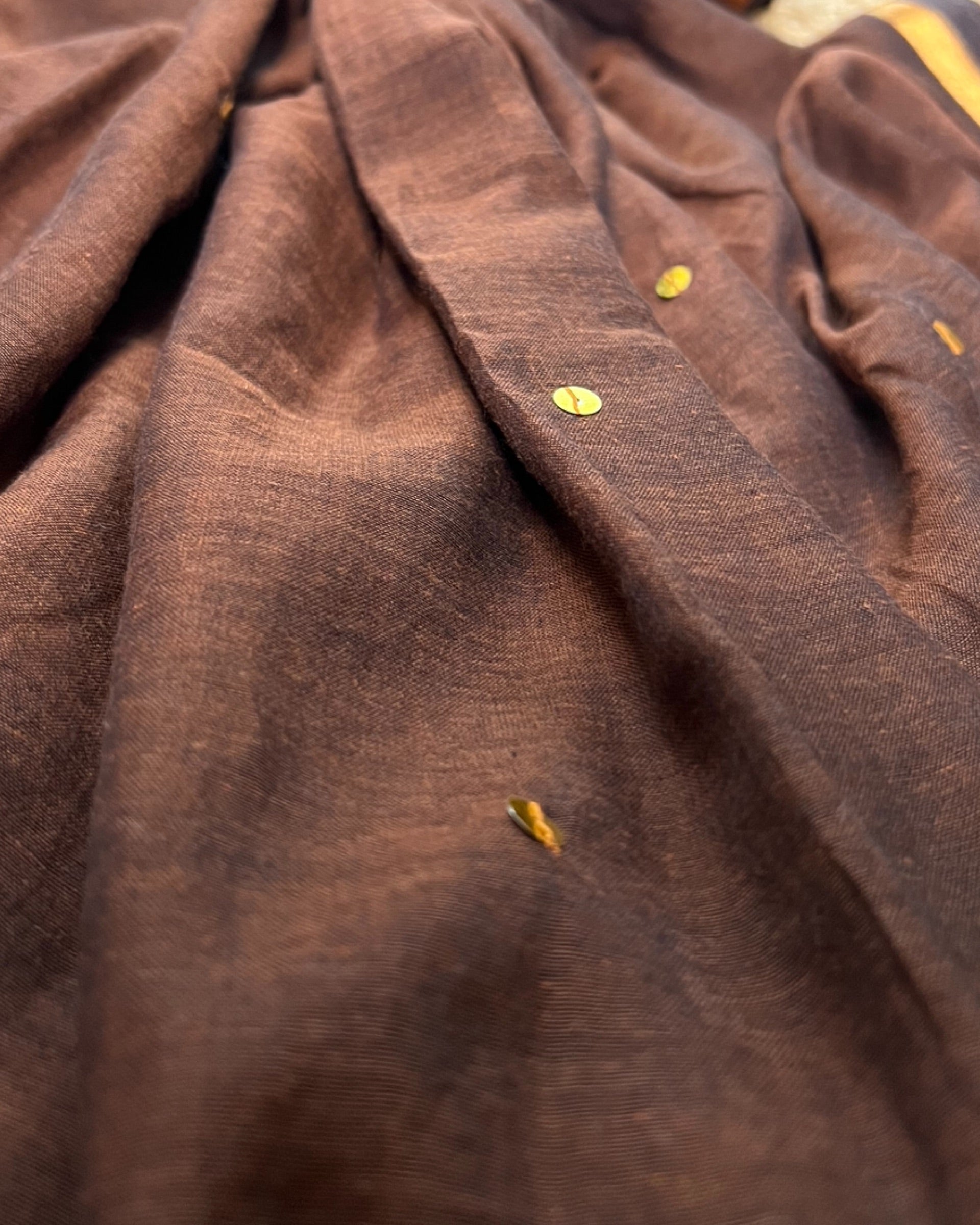 Soft and Comfortable mulmul cotton saree in chocolate caramel brown shade with sequin emblishment for festive or party wear at reasonable price