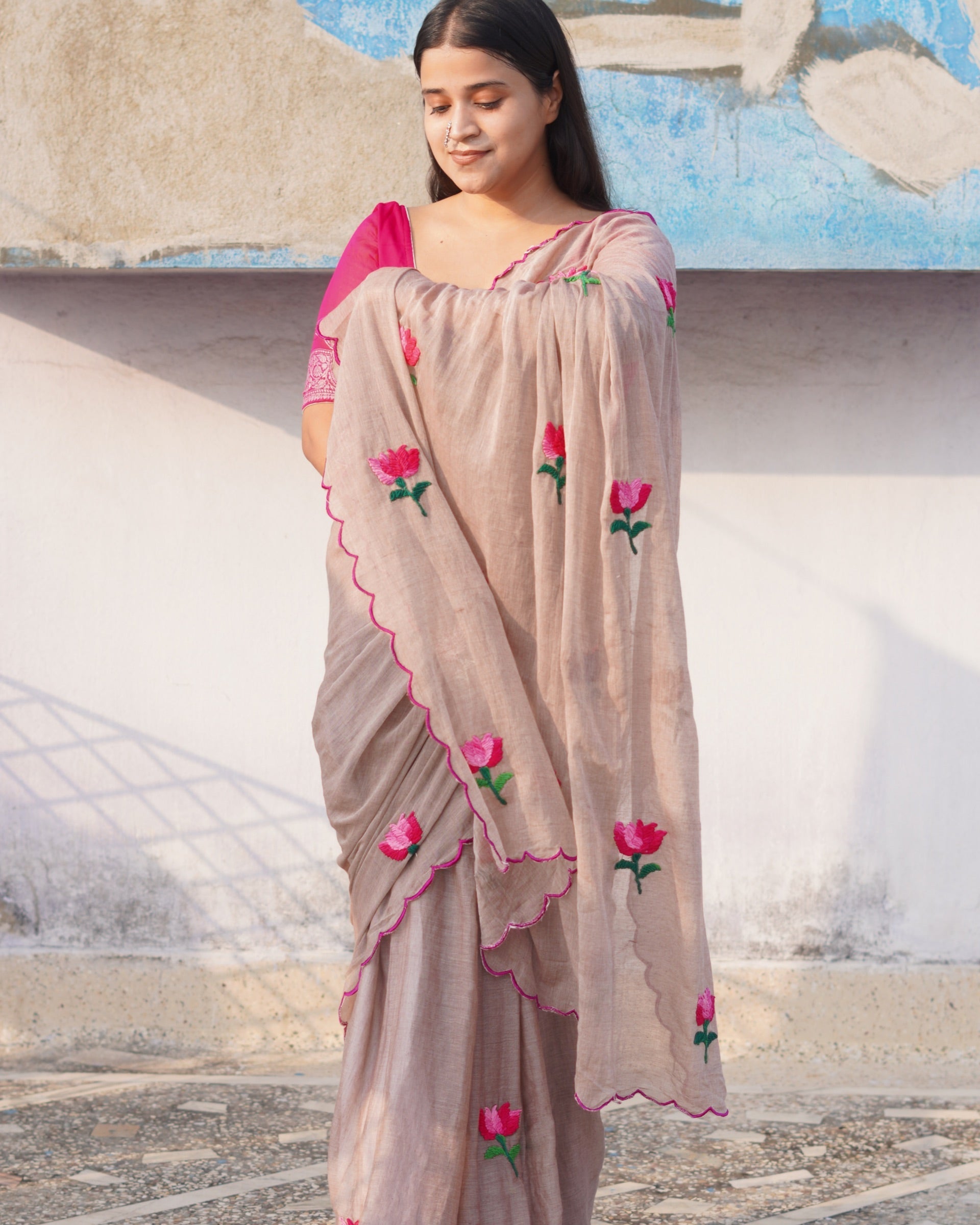Mulmul cotton saree with fine embroidery, a breathable saree for minimal everyday wear.