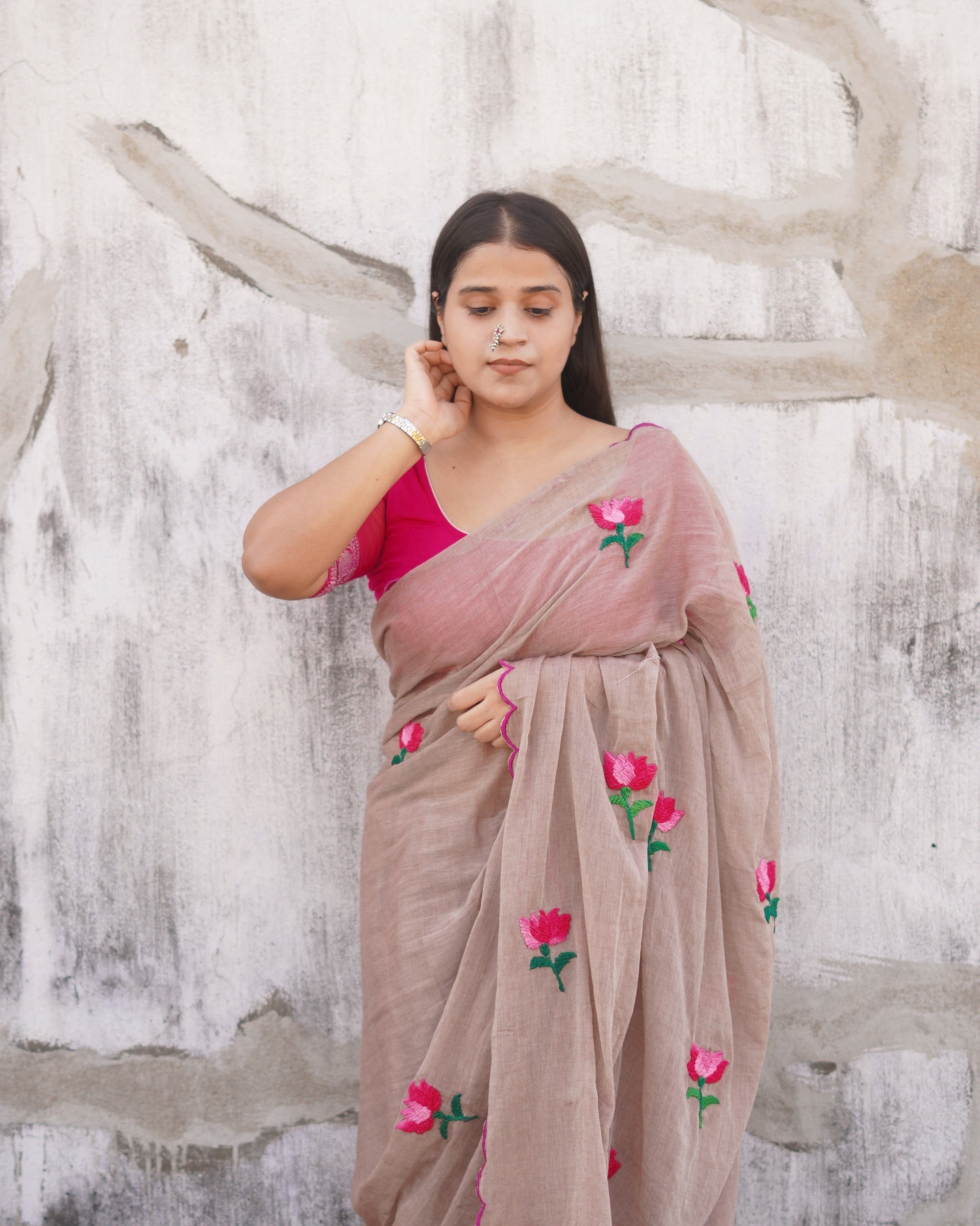 Mulmul cotton saree with delicate embroidery, soft airy comfort perfect for summer styling.