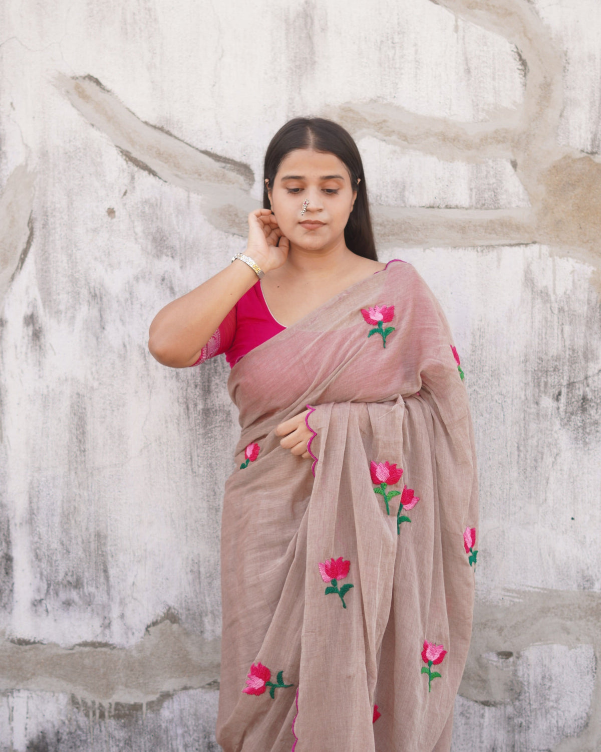 Mulmul cotton saree with delicate embroidery, soft airy comfort perfect for summer styling.