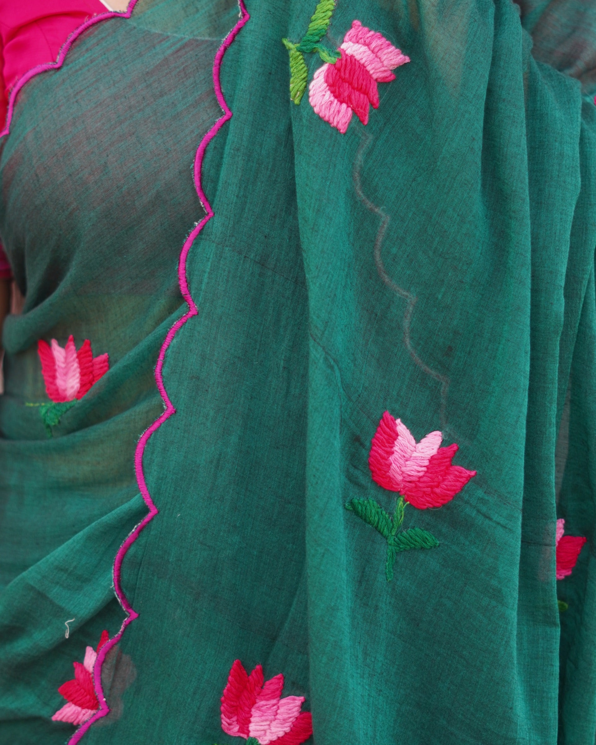 Lotus Lake cotton saree, handcrafted with refined embroidery for a breathable and graceful everyday look.