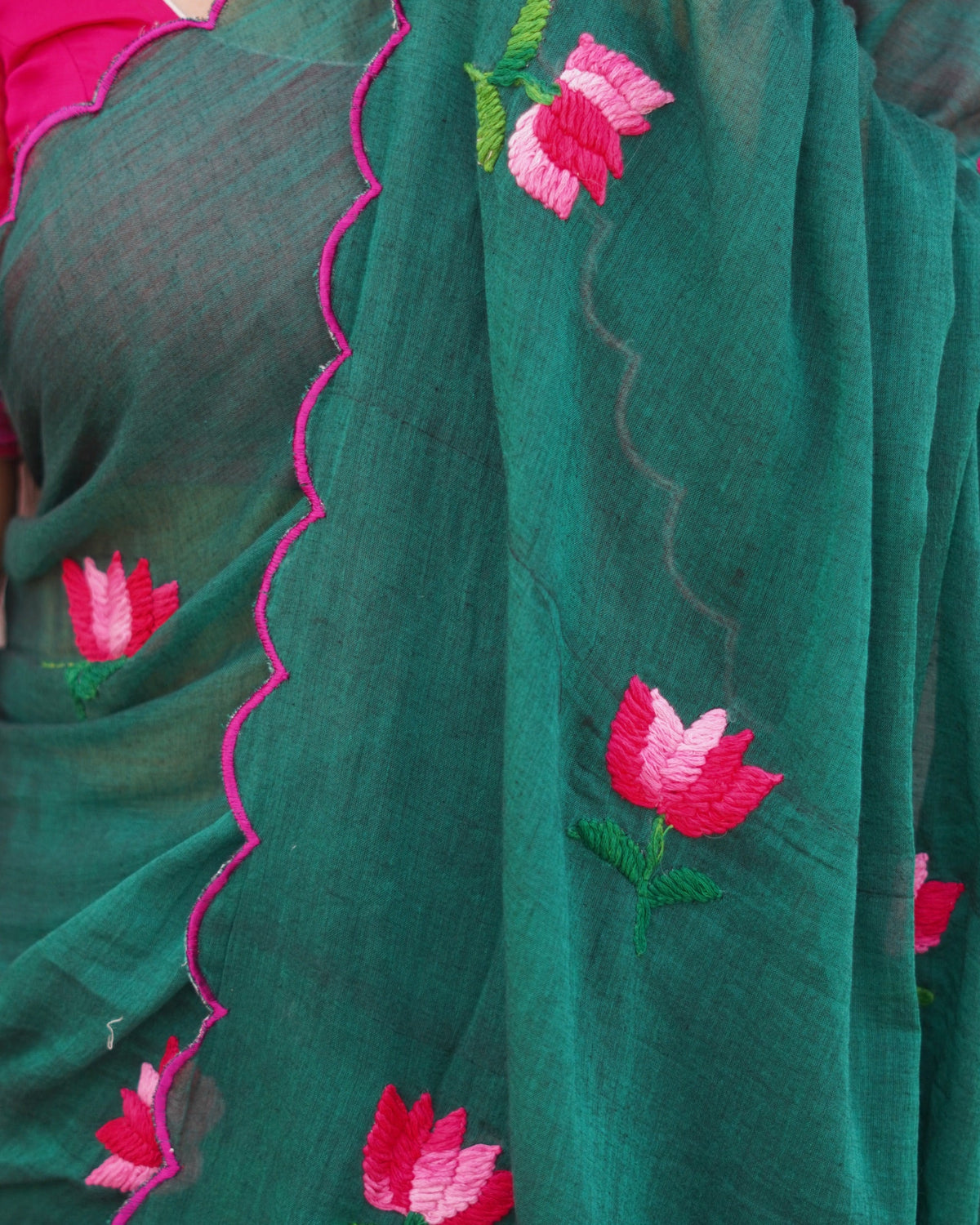 Lotus Lake cotton saree, handcrafted with refined embroidery for a breathable and graceful everyday look.