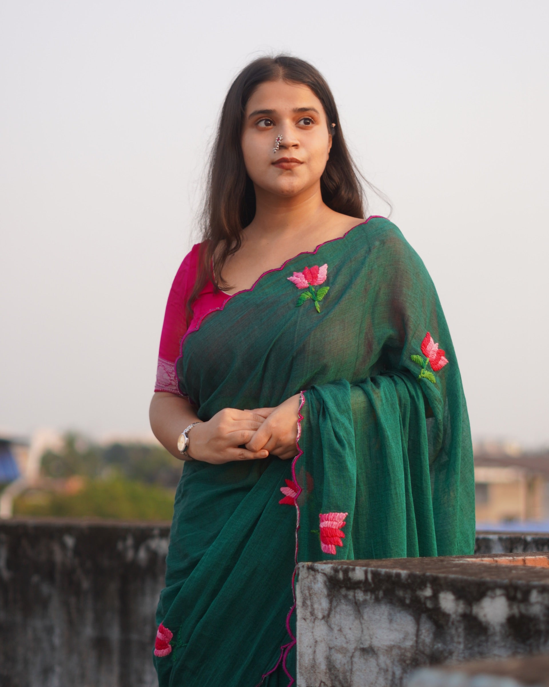 Mulmul cotton saree with delicate embroidery, soft airy comfort designed for effortless summer styling.