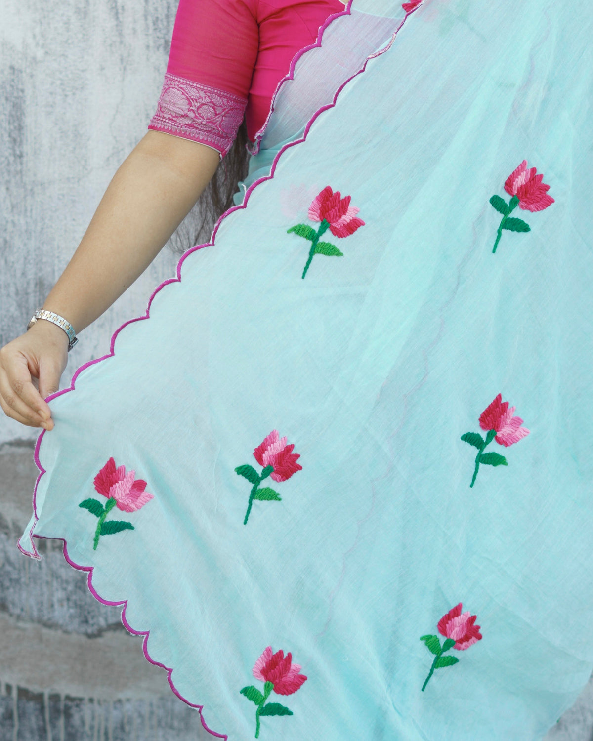 Lotus Ocean cyan blue embroidered mulmul cotton saree, a lightweight breathable saree for summer and festive wear.