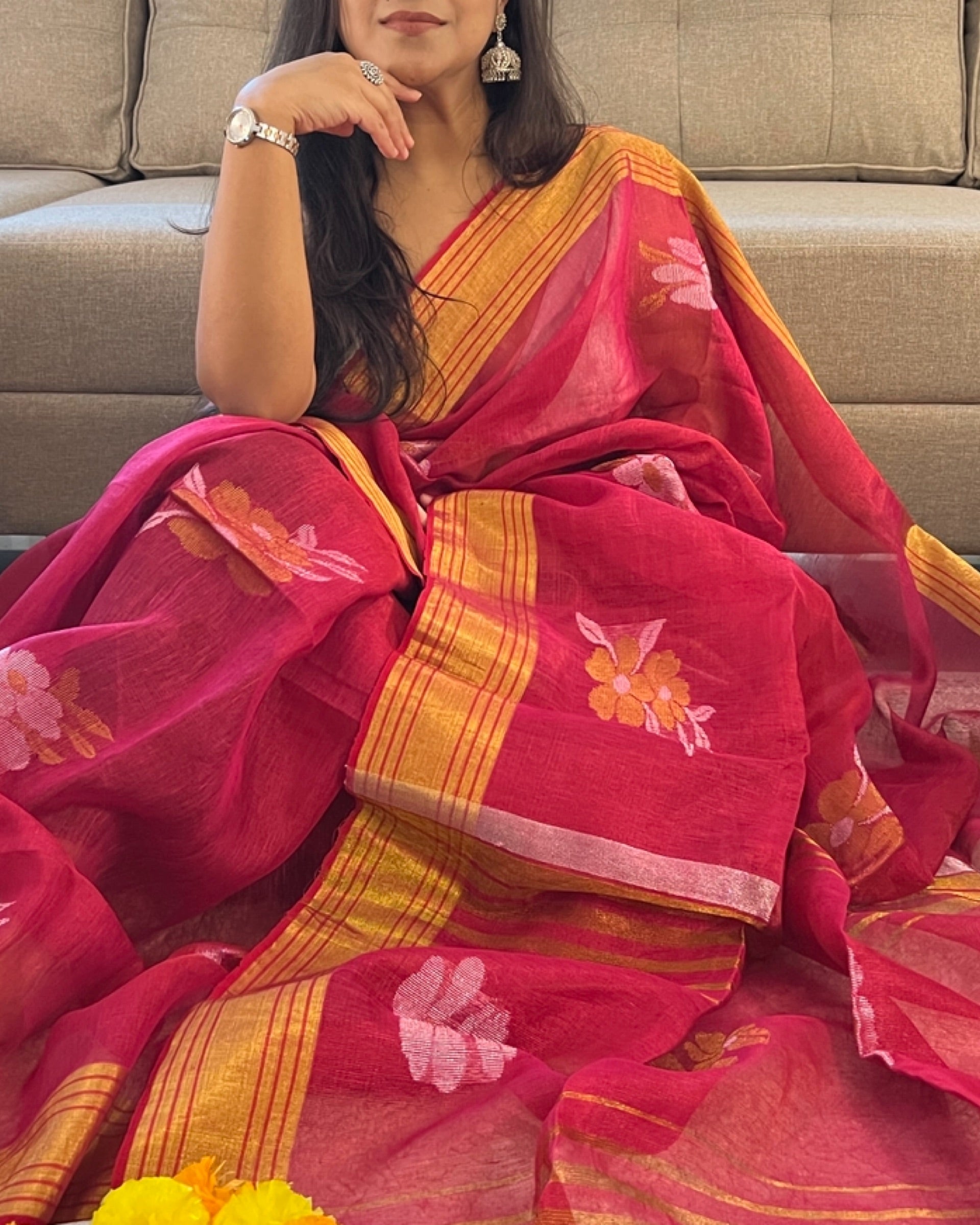 Red golden festive saree with soft tissue fabric and graceful ethnic appeal