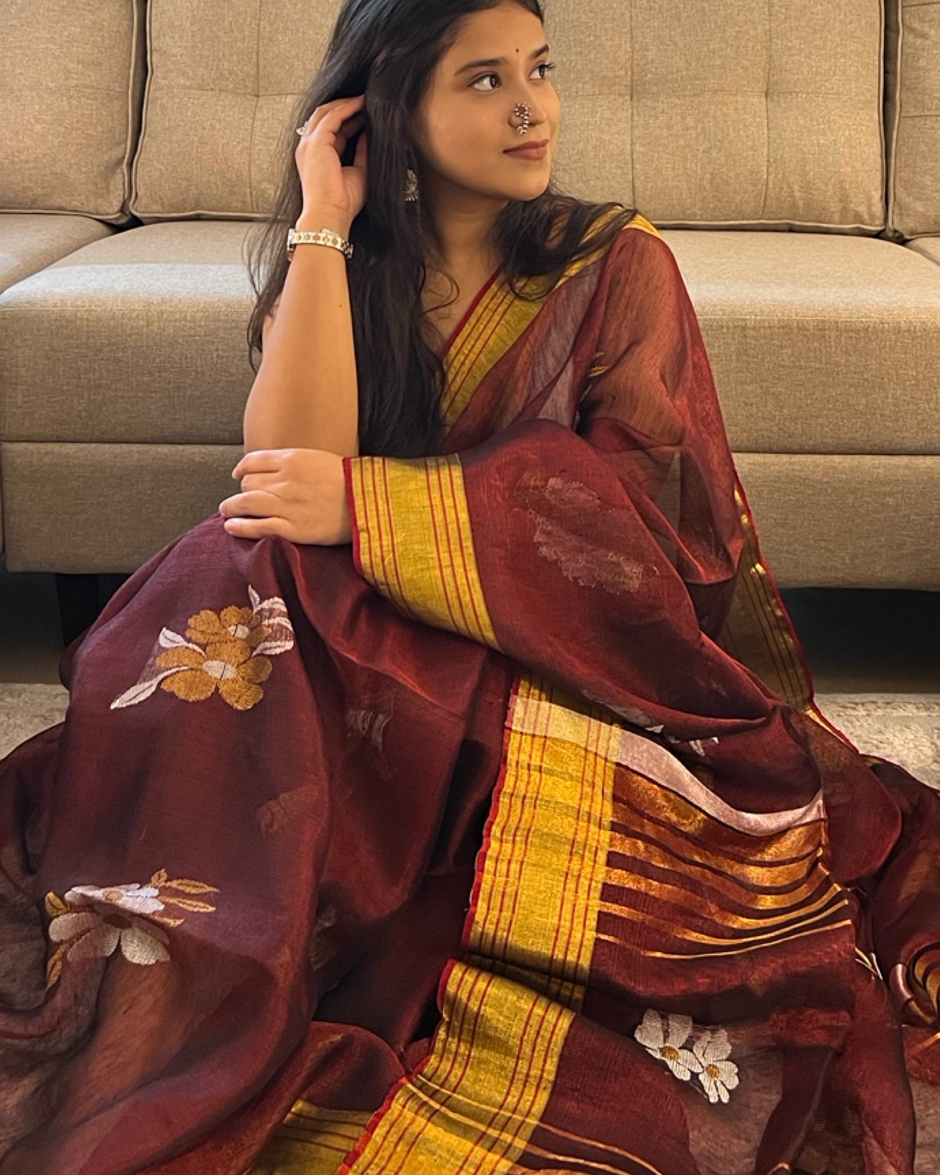 Maroon golden designer tissue saree with lightweight festive drape by Shop AaMe