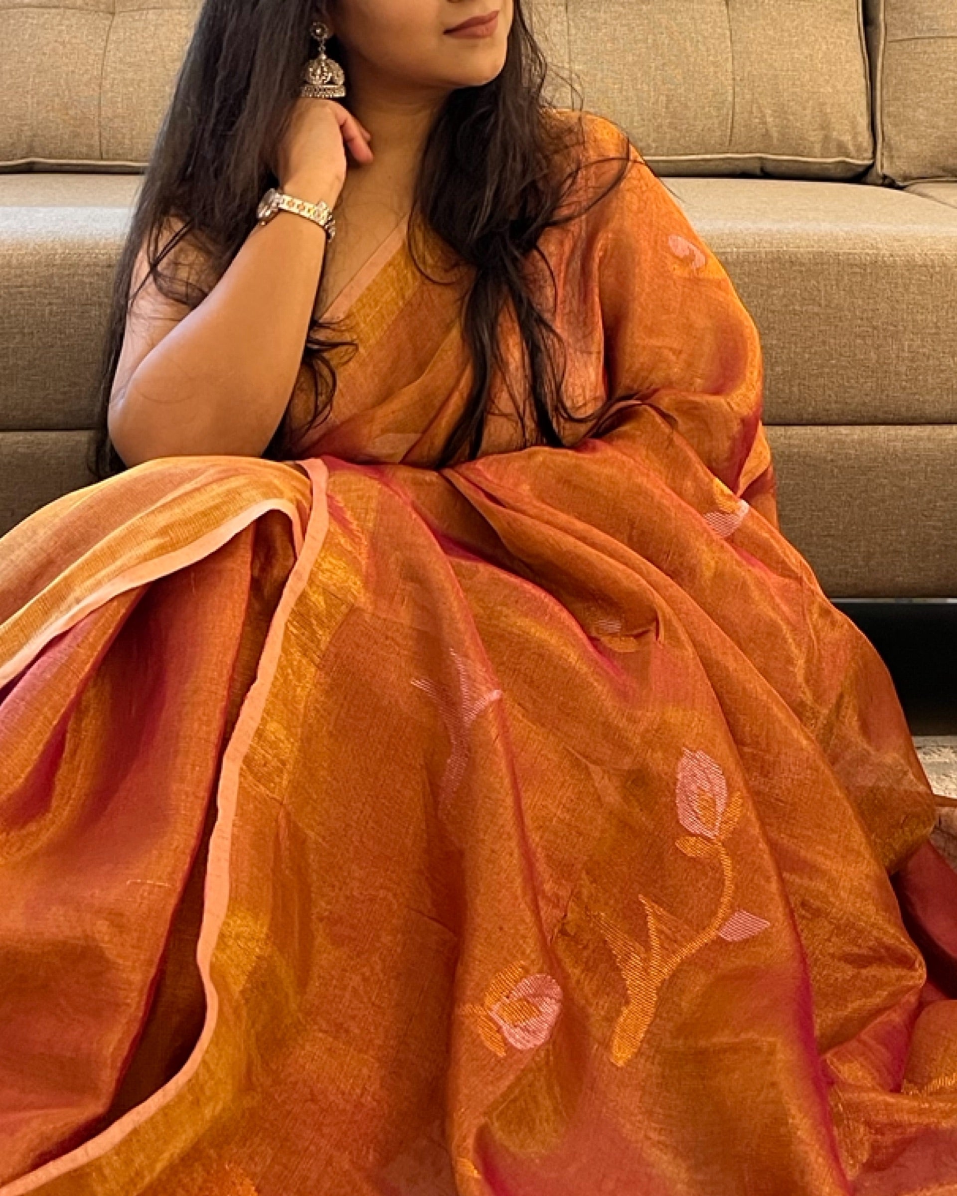 Mrignayani tissue saree featuring elegant peach golden tones for celebrations