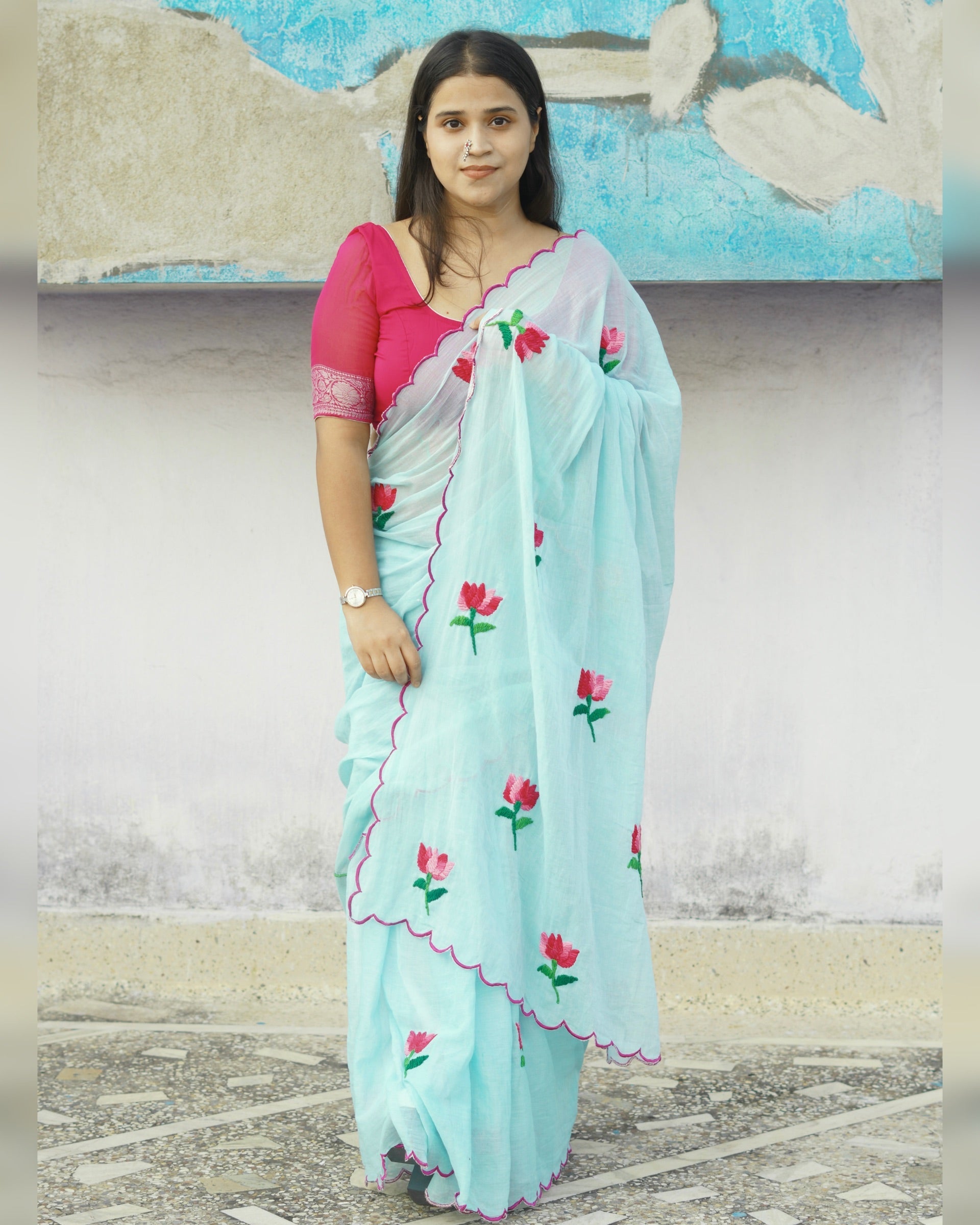 Lotus Ocean blue cotton saree, handcrafted with lotus motifs for a breathable and graceful look.