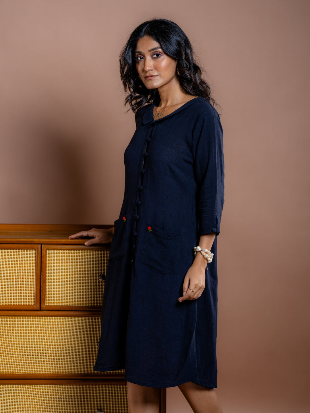Handwoven in organic cotton, this black Noir fern summer cotton dress adorn with hand-embroiderd motifs is a must have dress in every wardrobe. Sustainably made in India, this dress comes in all small and plus sizes. 4xl and 5xl can be made on customization request.