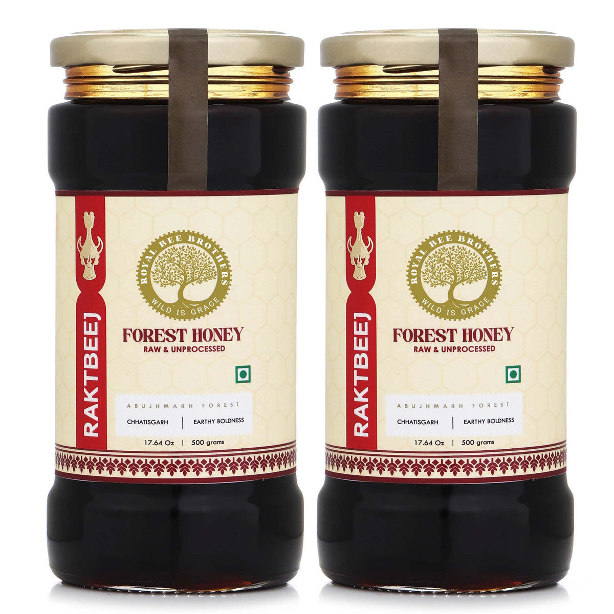Two jars of Forest Honey with Raktbee label on a white background