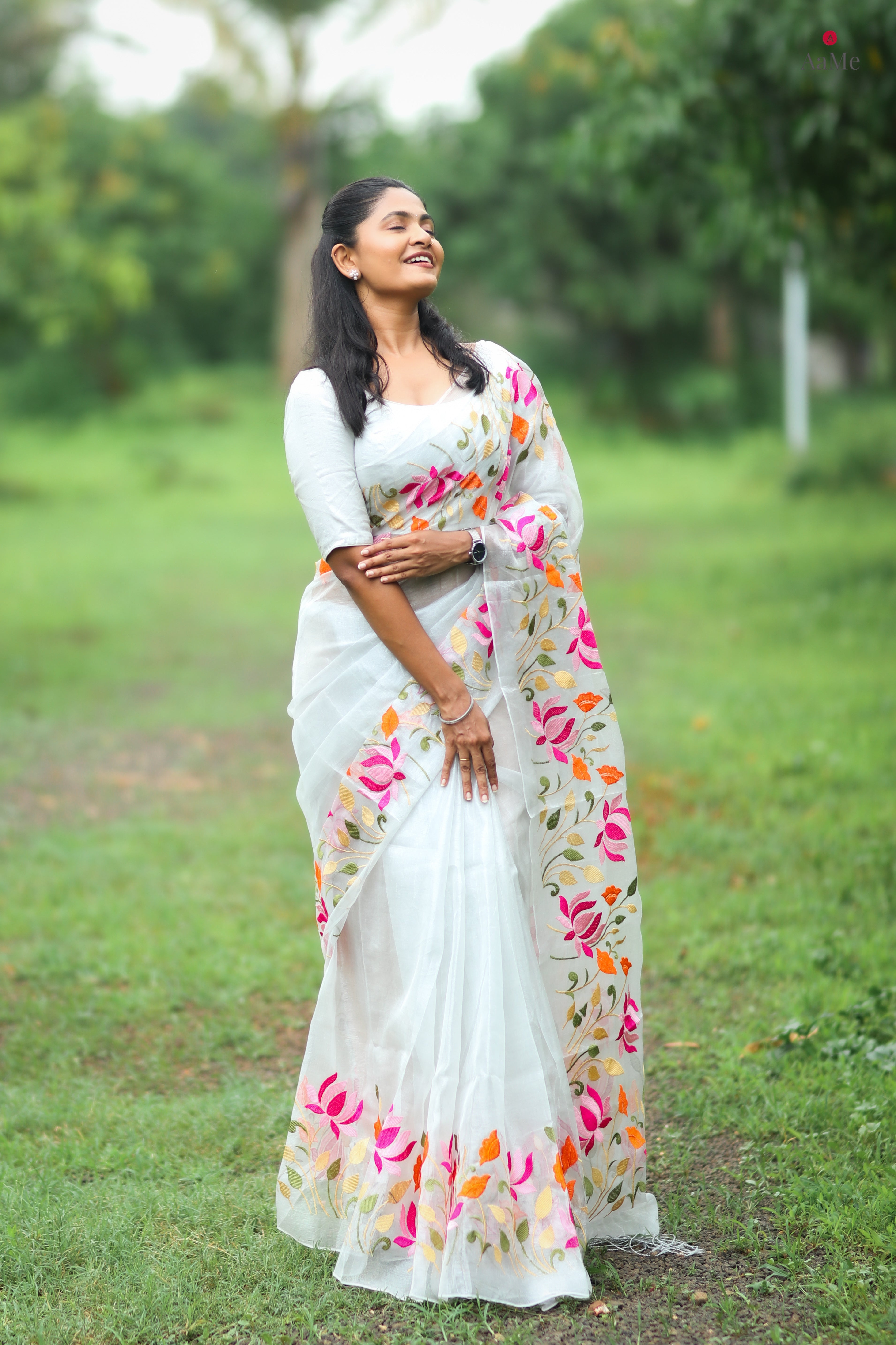 Moonlit Muse tissue saree featuring a graceful white drape for special occasions