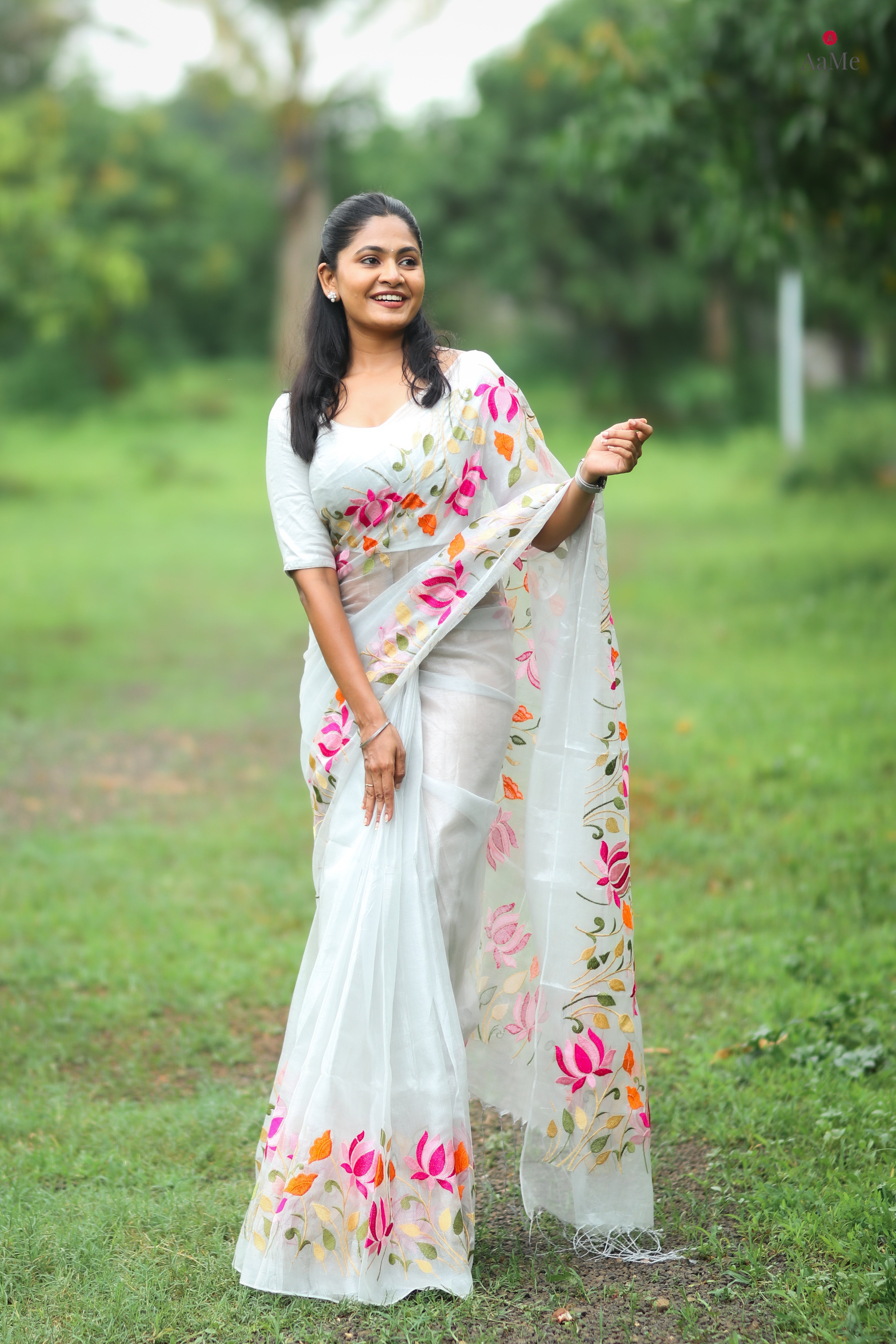 Silver white viral tissue saree with floral embroidery orange and pink