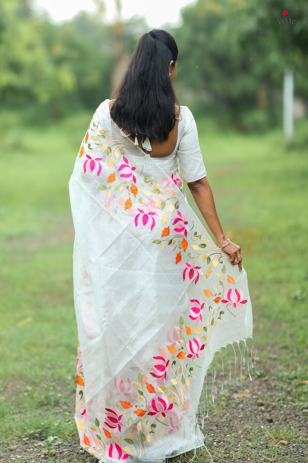 Designer white tissue saree for parties and special occasions by Shop AaMe