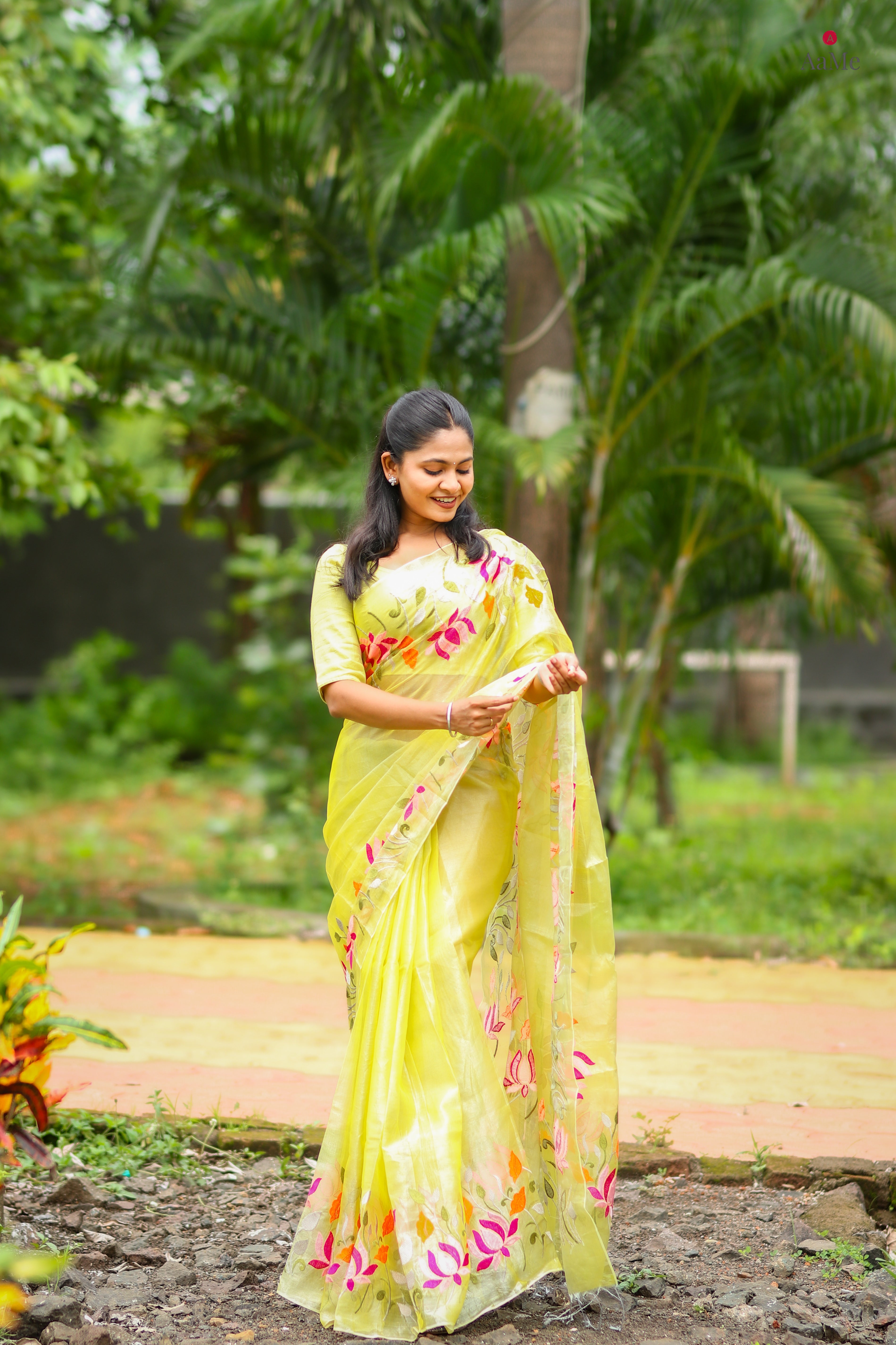 Yellow Shopaame tissue saree with floral embroidery orange and pink