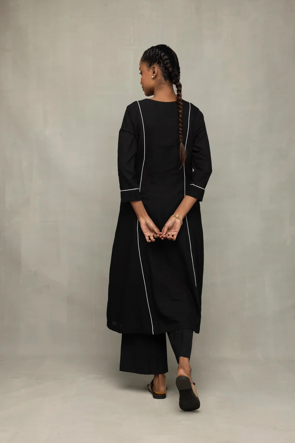 Back View of Black Relaxed Kurta Set with White Piping and Jamdani Dupatta