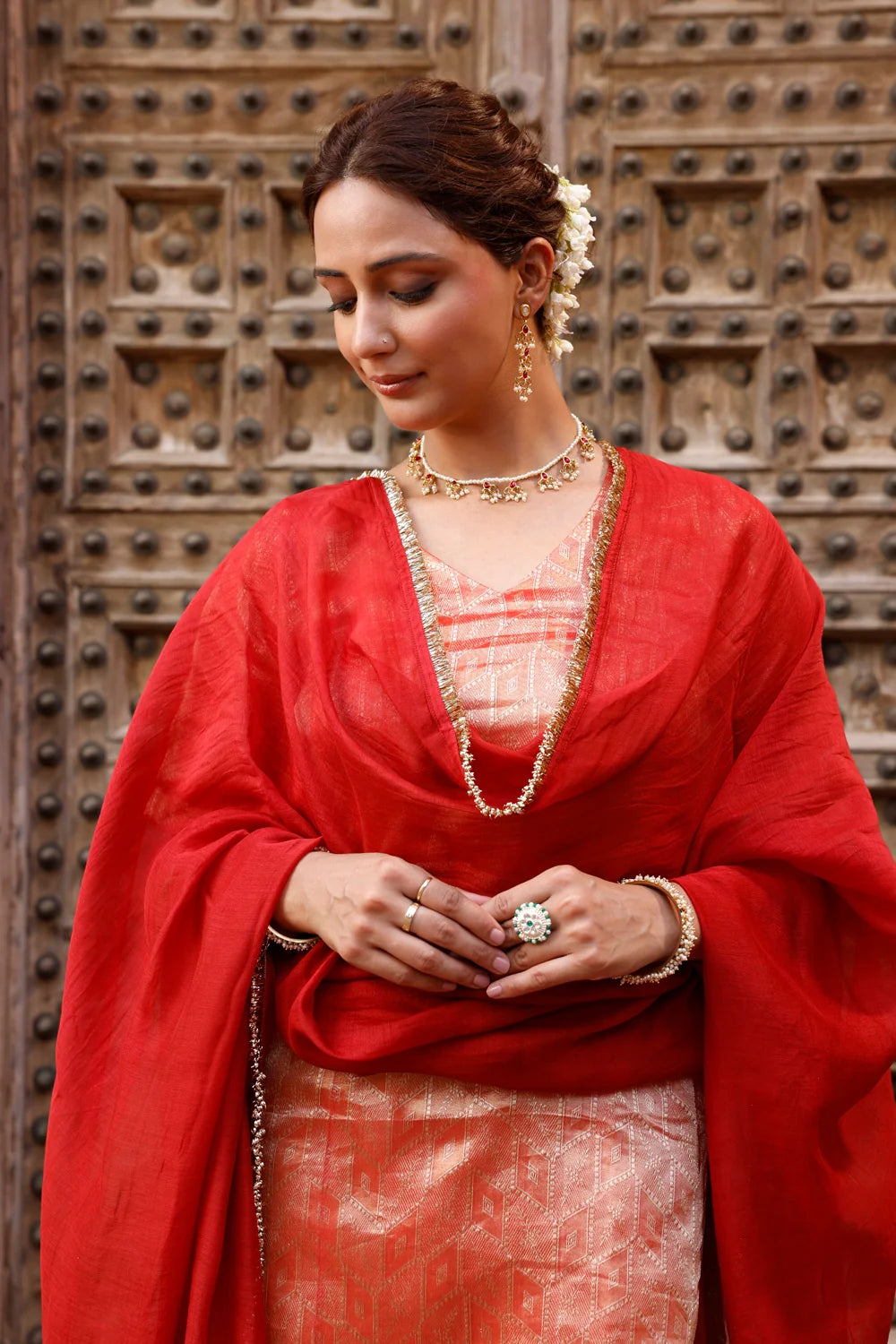 Close Up of Banarasi Silk Weave on Metallic Orange Pure Silk Kurta Set
