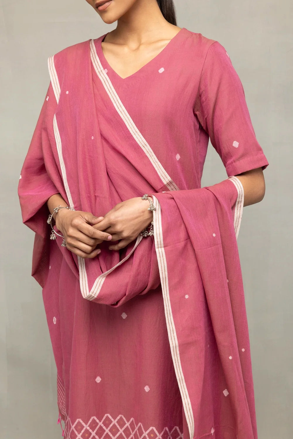 Close Up of Cross Motifs Jamdani Weave on Dusty Rose Cotton Kurta