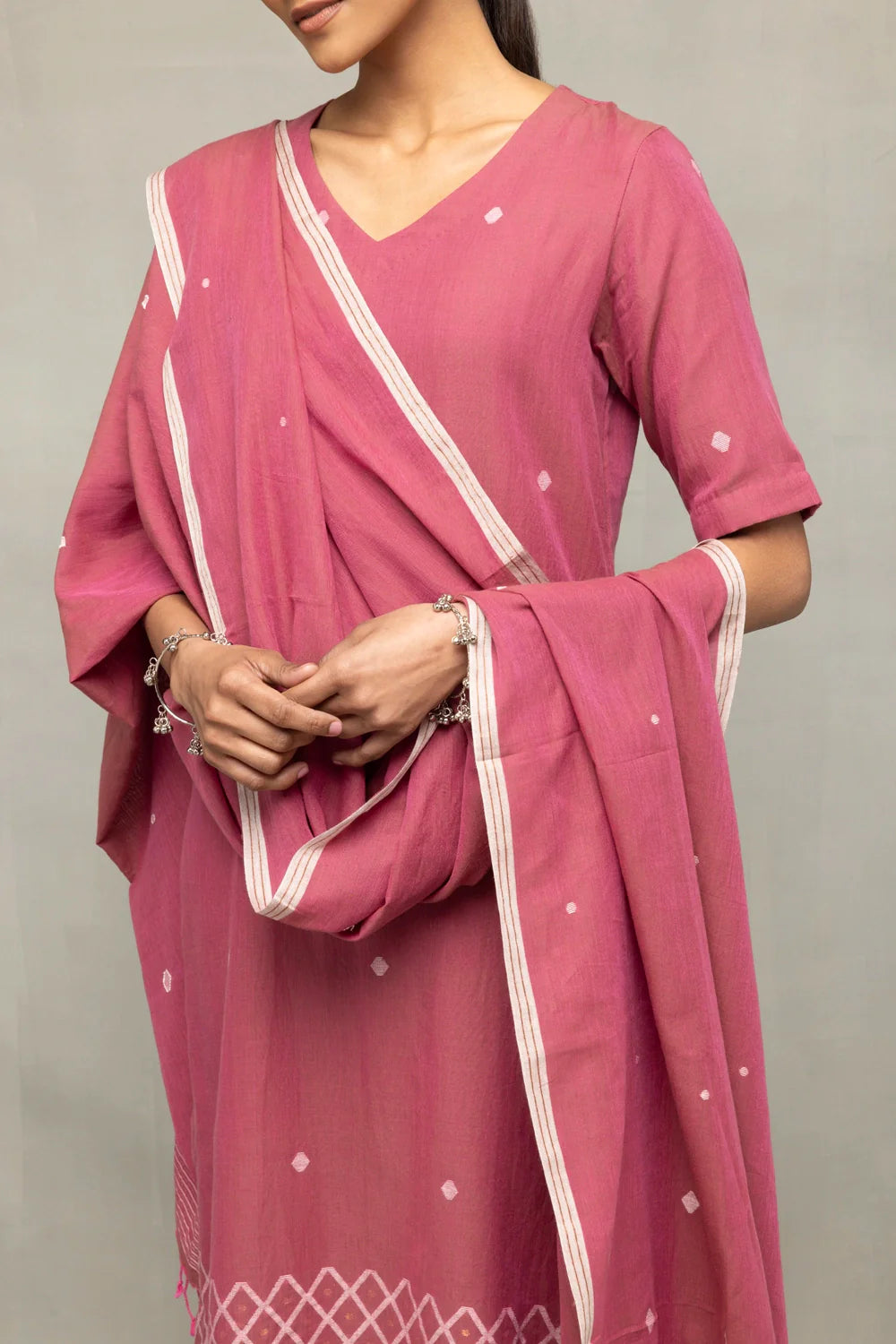 Close Up of Cross Motifs Jamdani Weave on Dusty Rose Cotton Kurta
