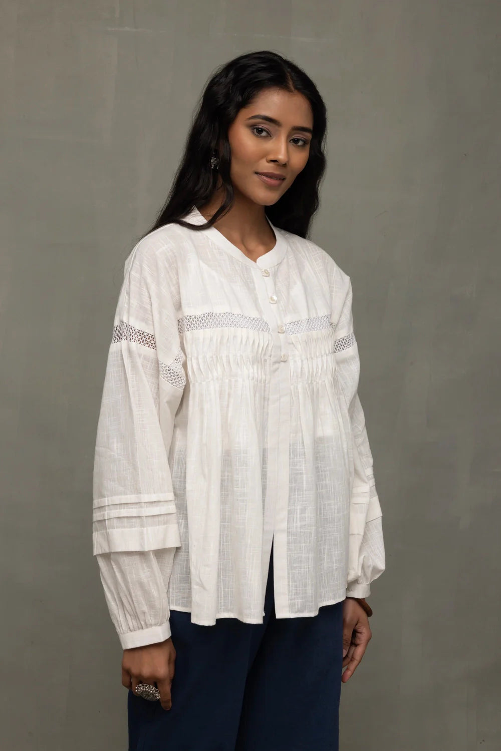 Close Up of Fabric Texture on White Breezy Relaxed Fit Top