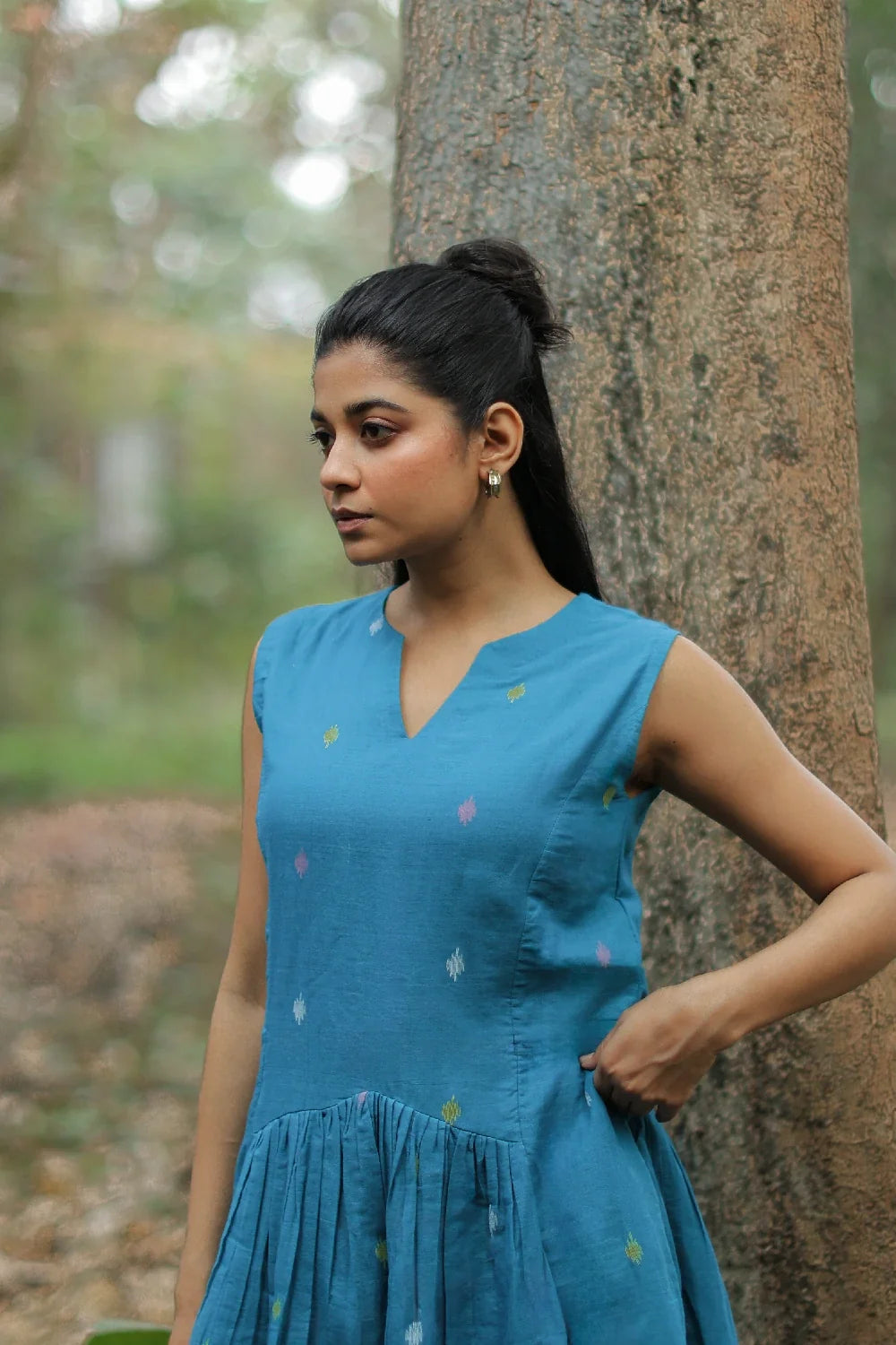 Close Up of Jamdani Weave Motifs on Fern Green Dress