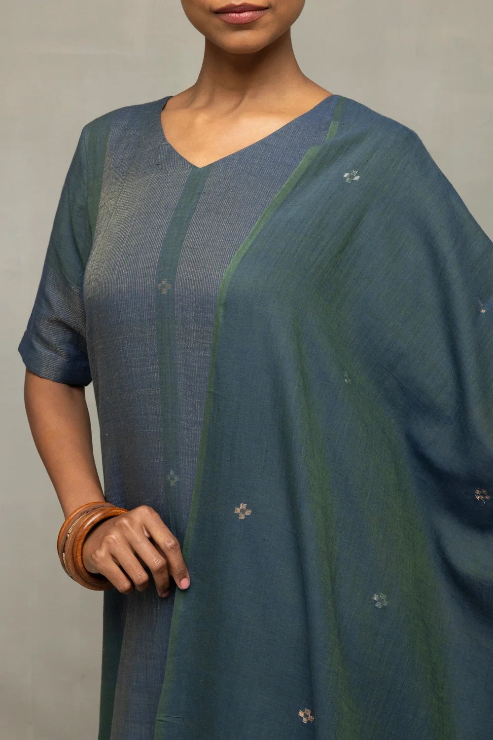 Close Up of Jamdani Weave Motifs on Teal Kurta Set with Dupatta
