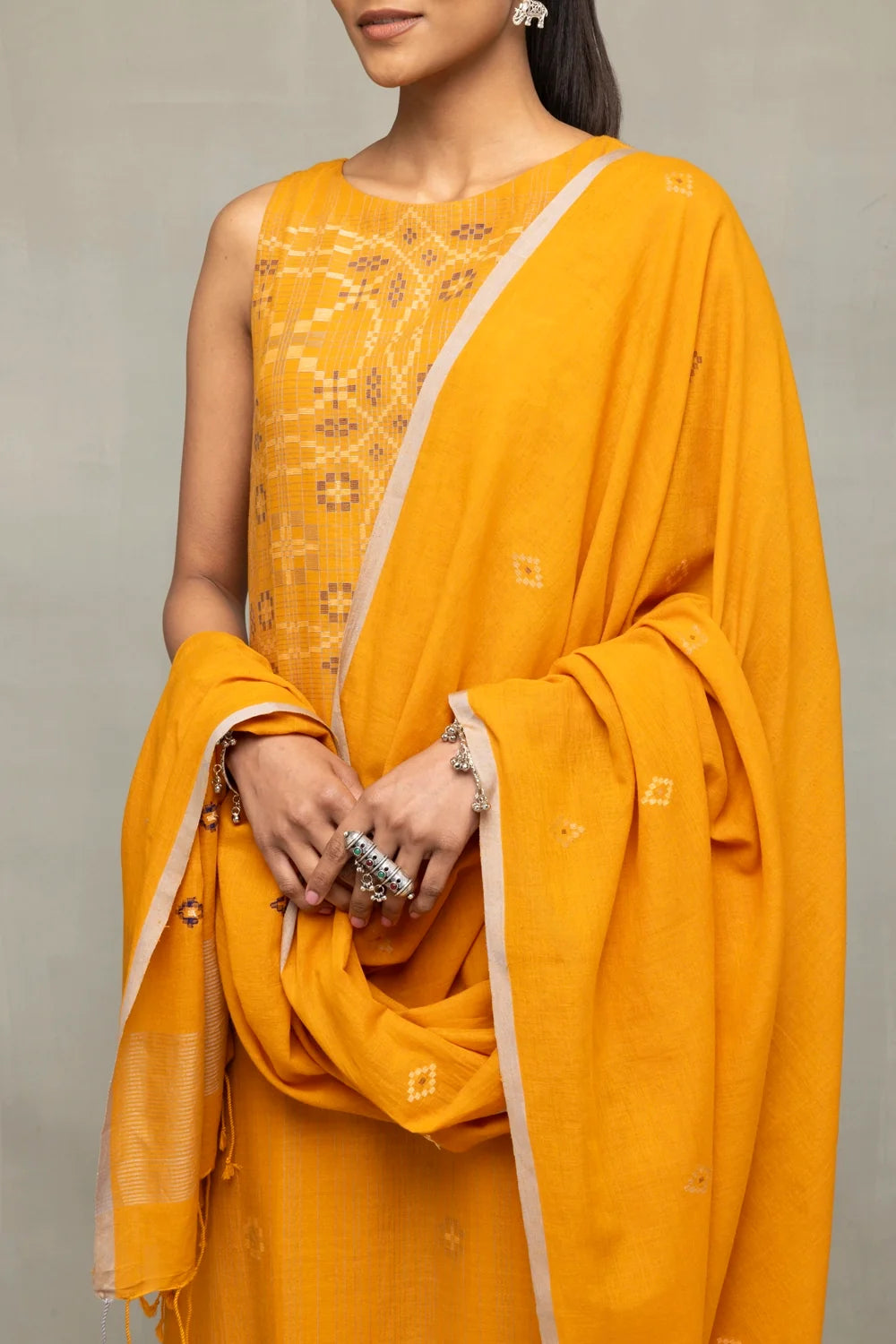 Close Up of Moonlight Jamdani Weave Motifs on Mustard Cotton Kurta