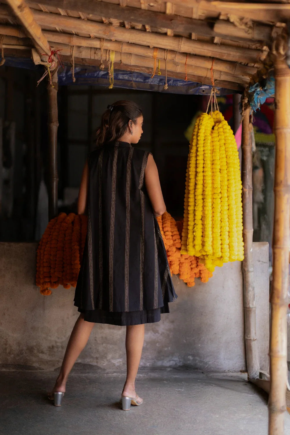 Close Up of South Cotton Woven Texture on Noir Black Dress with Shrug