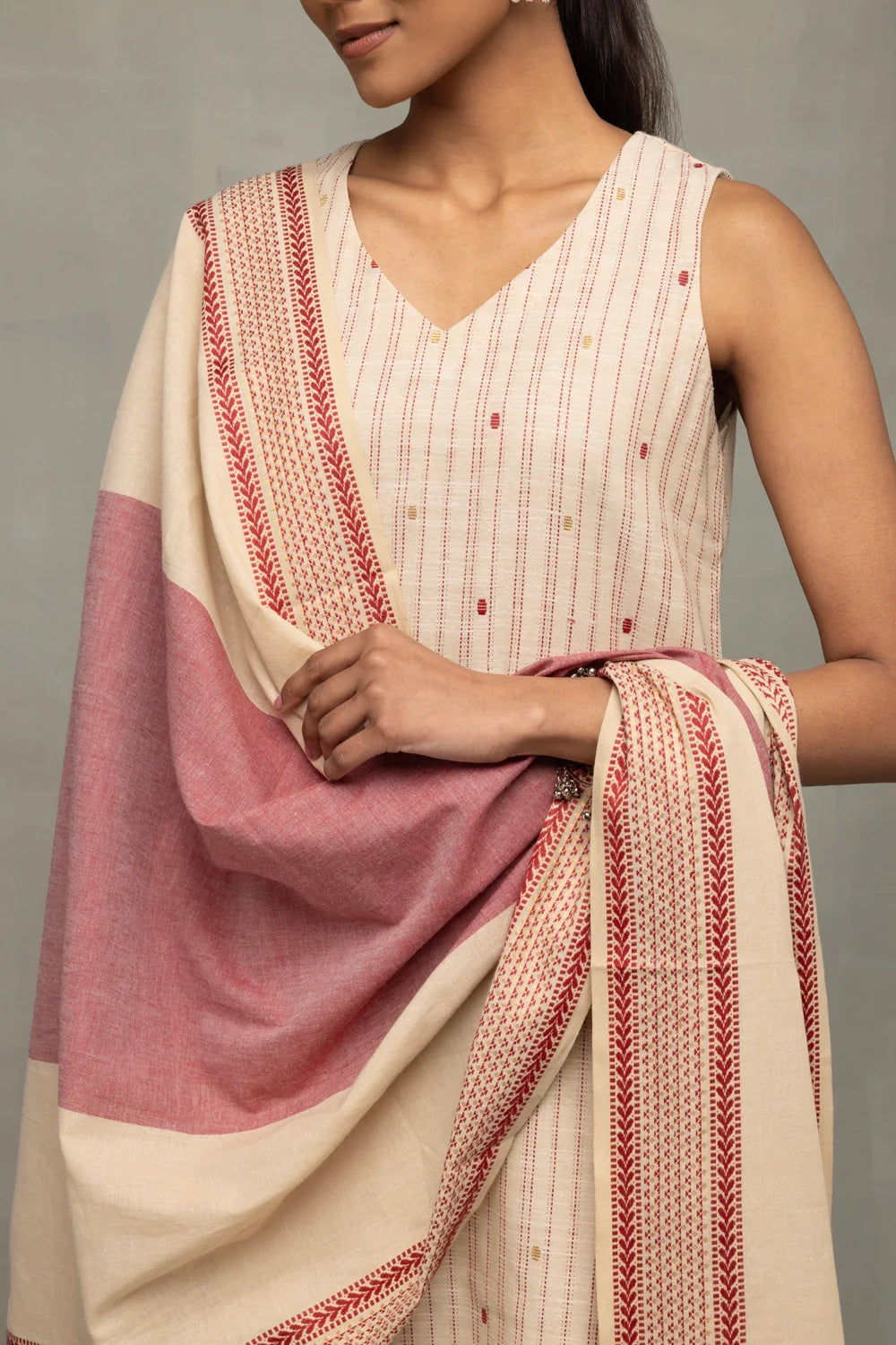 Close Up of Zari Weave on Cream and Pink South Cotton Kurta Set