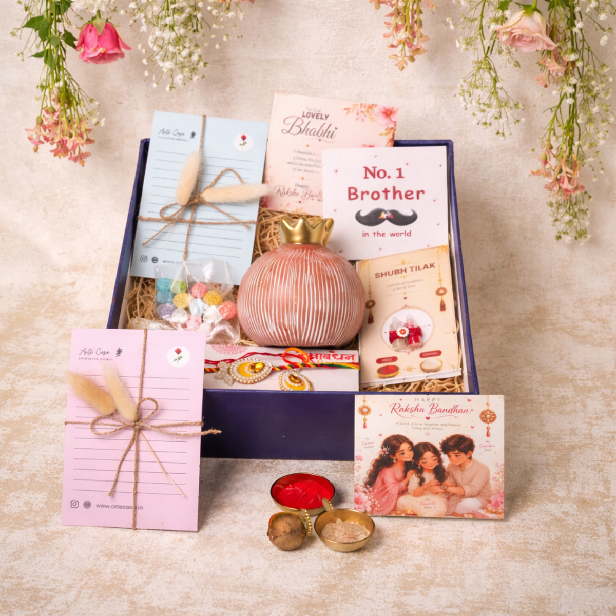 Artecasa Pink Pomegranate Rakhi Gift Hamper | Premium Bhai Bhabhi Raksha Bandhan Gift Hamper - https://artecasa.in/