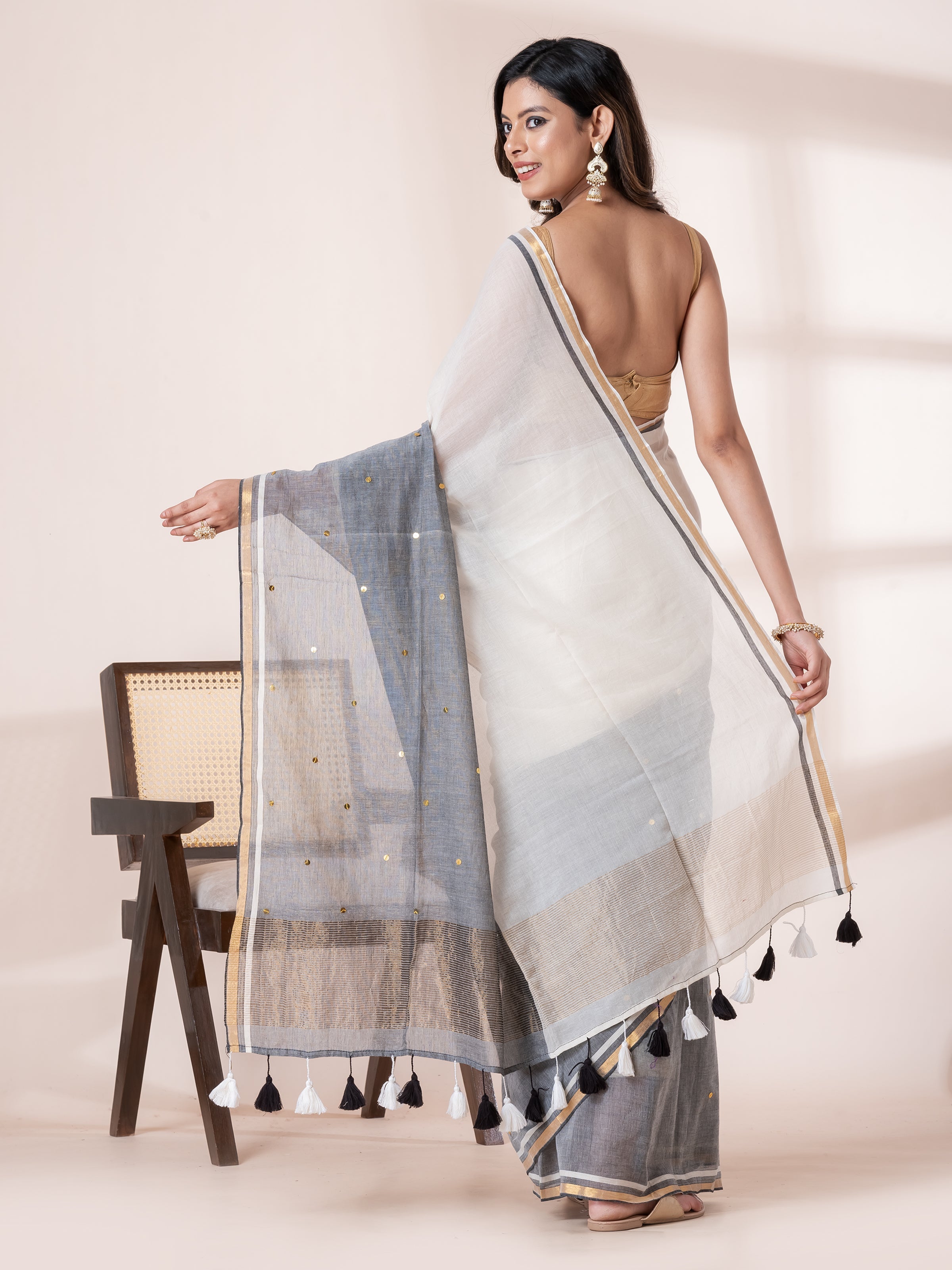 Black grey mulmul cotton saree with elegant sequins work for festive styling