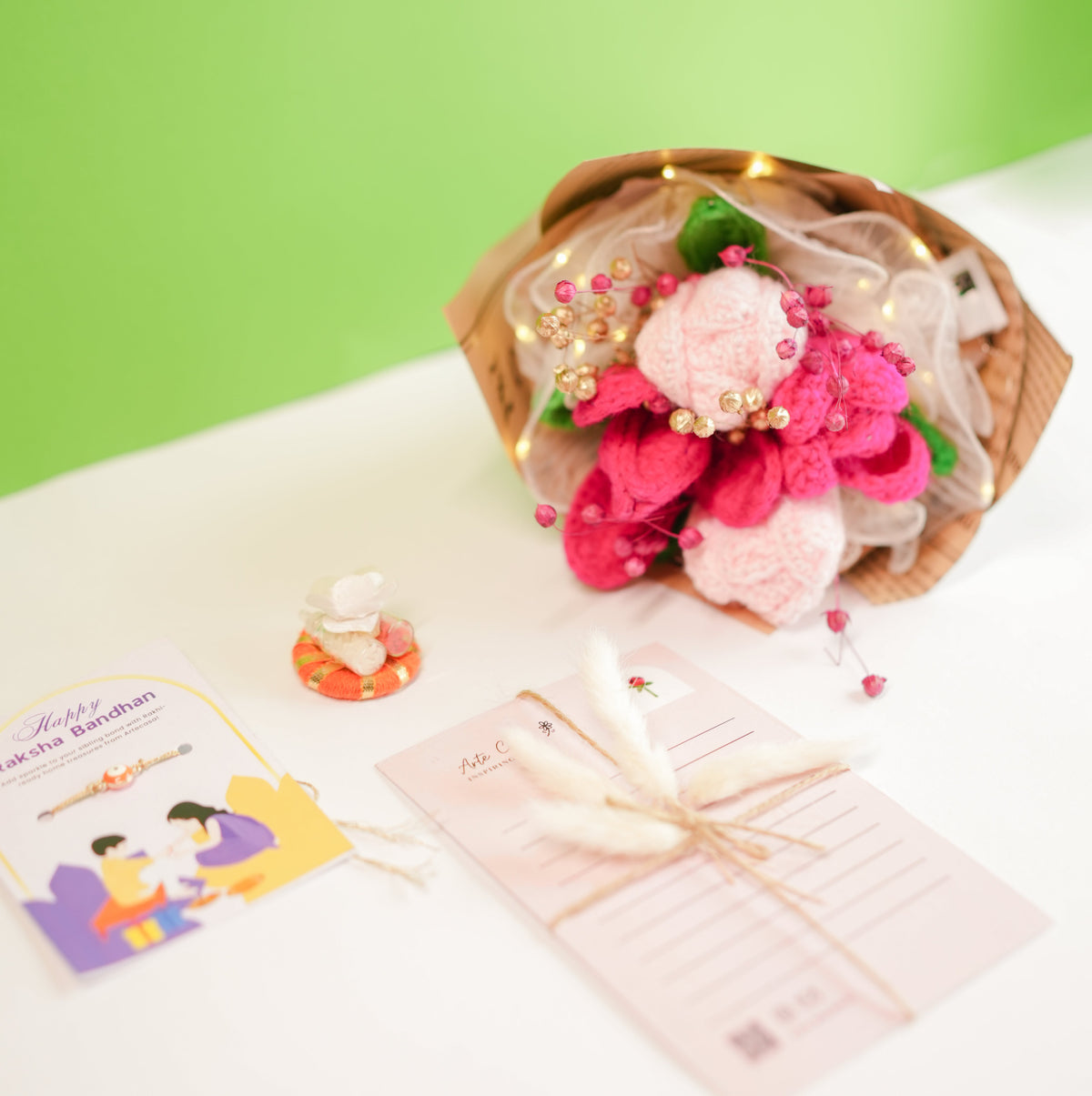 Pretty Pansy Bouquet Rakhi hamper - https://artecasa.in/