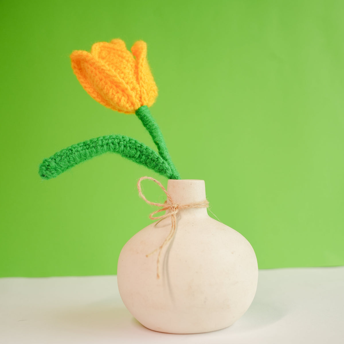 onion vase with yellow crochet tulip - https://artecasa.in/