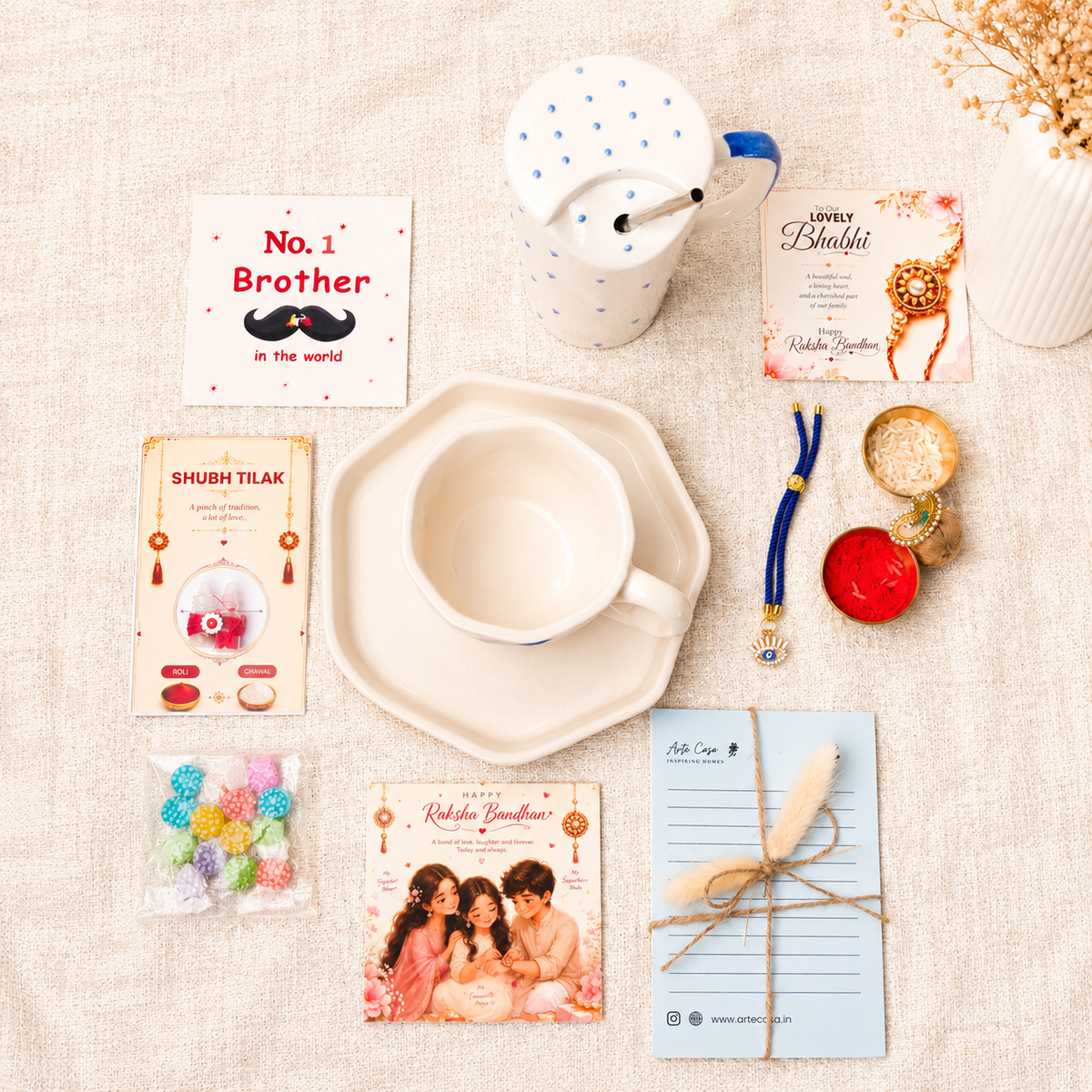 Artecasa Nazar Se Surakshit Rakhi Hamper | Evil Eye Rakhi Gift for Brother & Bhabhi - https://artecasa.in/