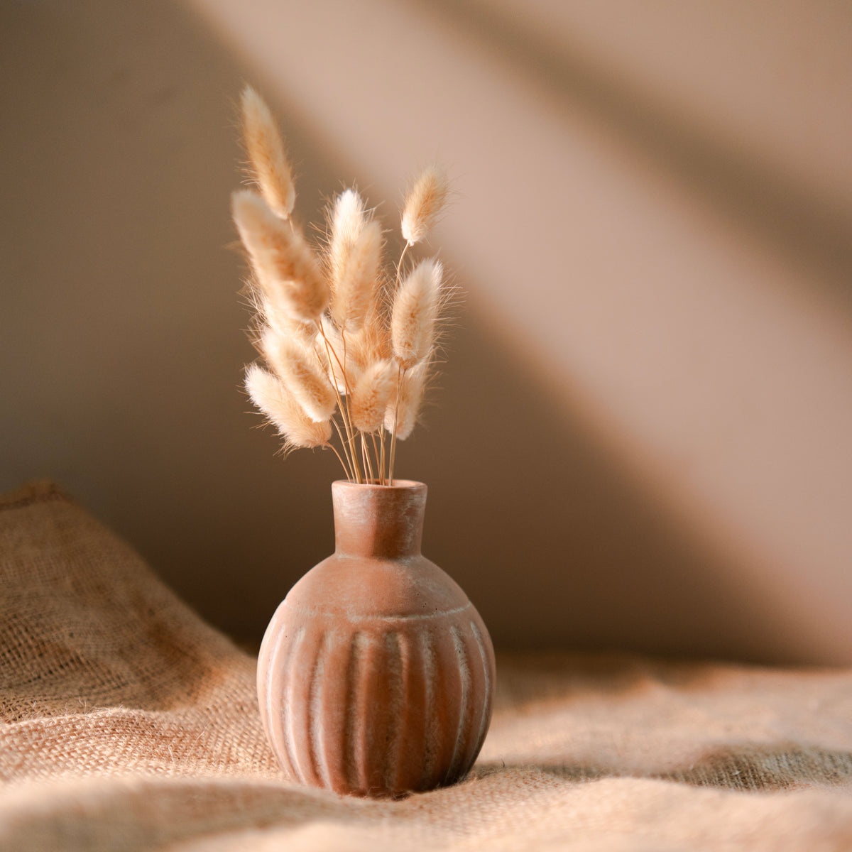 Rustic vase with bunny tails - https://artecasa.in/